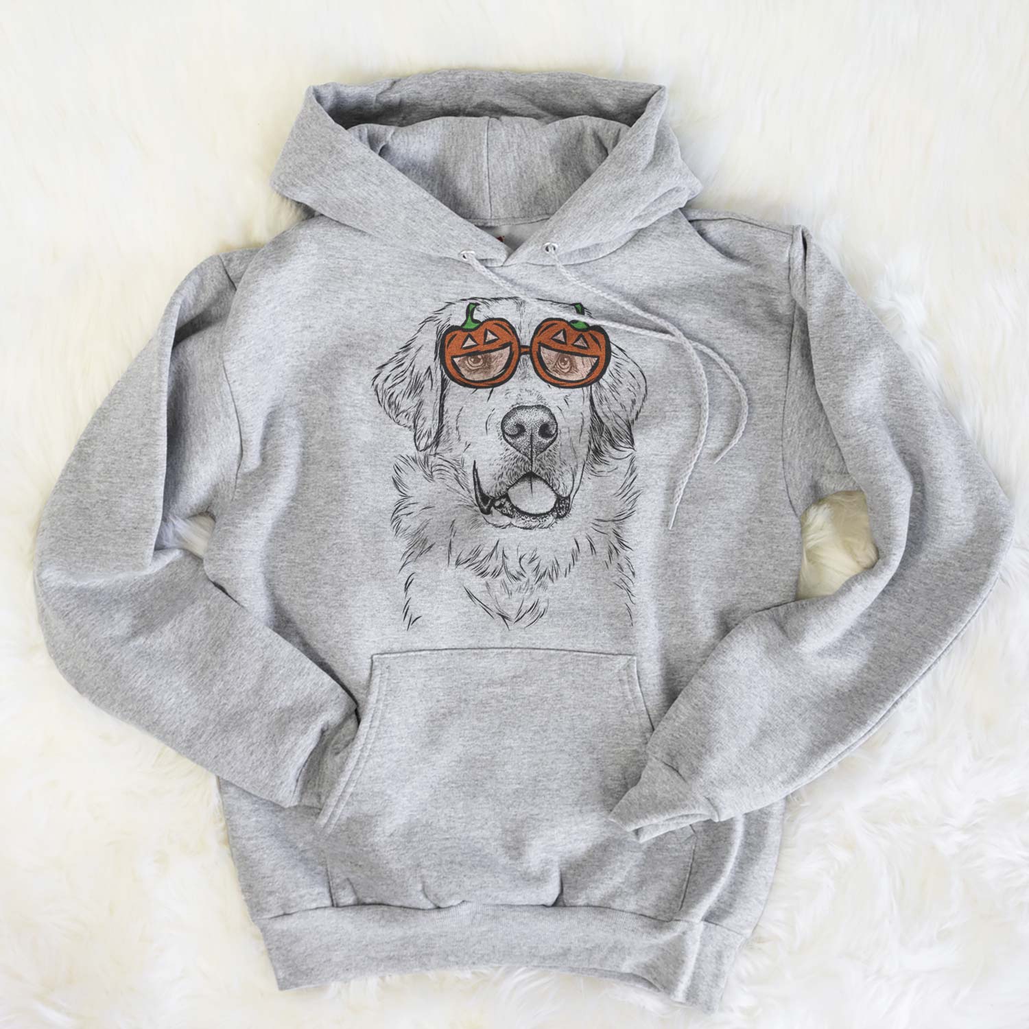Hand-drawn sketch of Brophy the Great Pyrenees wearing pumpkin glasses on a Grey pumpkin collection, flat lay