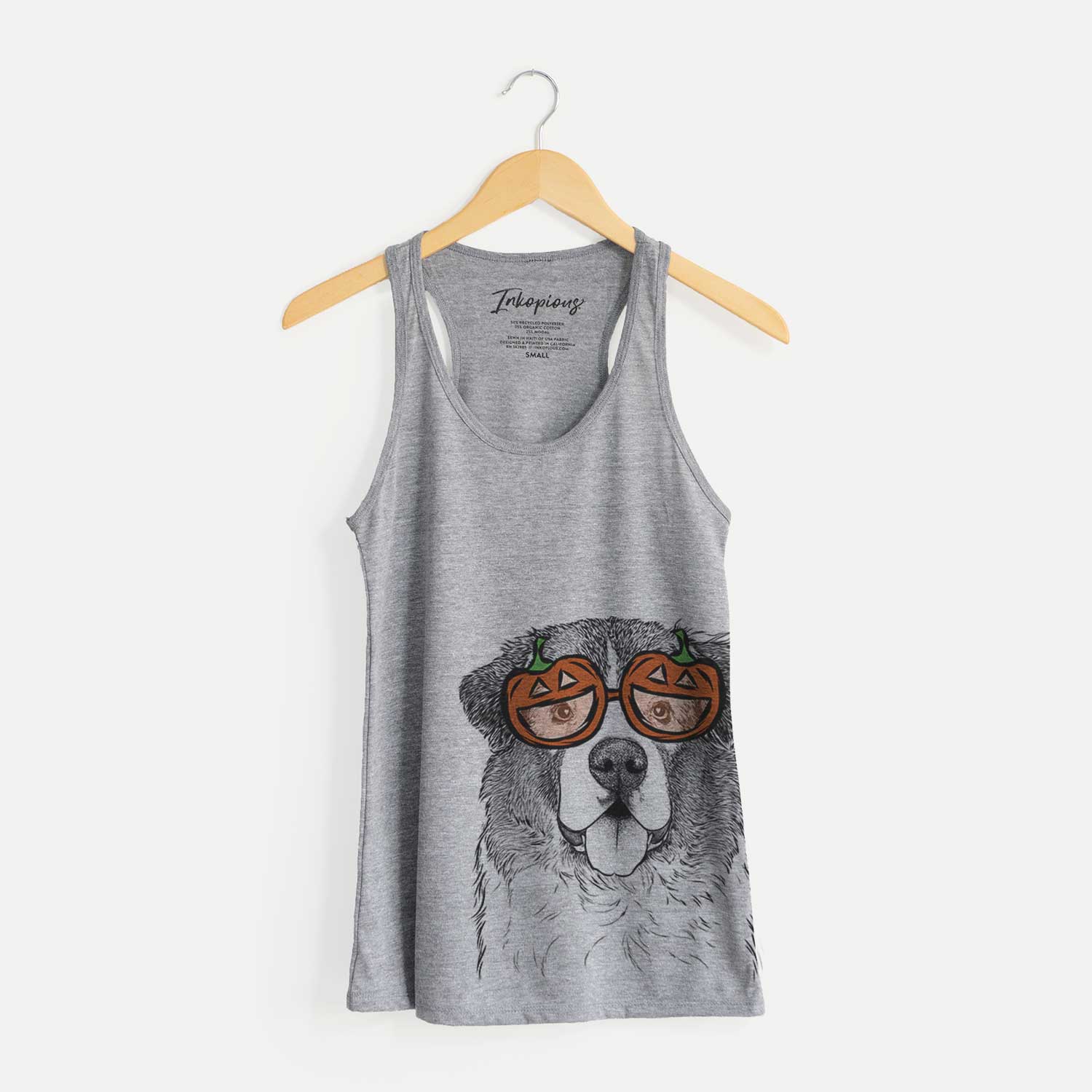 Hand-drawn sketch of Dilly the Saint Bernard wearing pumpkin glasses on a Grey pumpkin collection