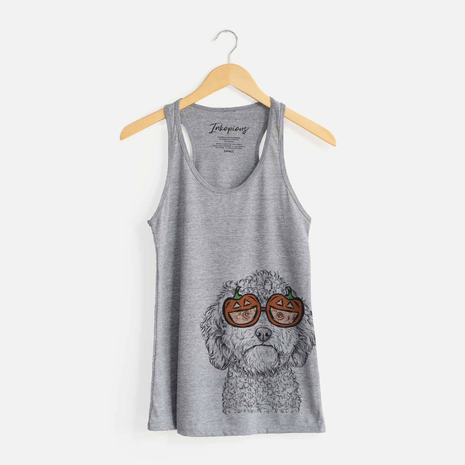 Hand-drawn sketch of Edgar the Shihpoo wearing pumpkin glasses on a Grey pumpkin collection