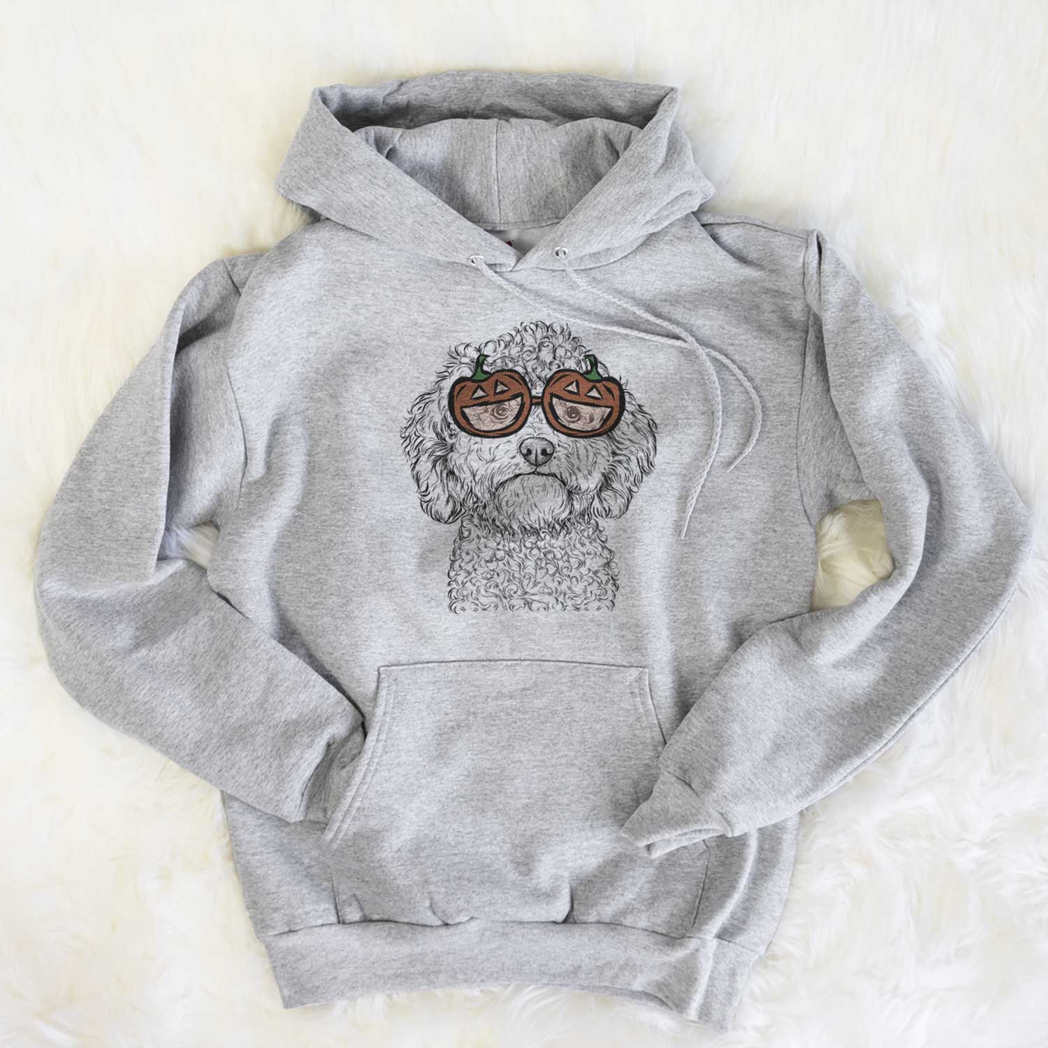 Hand-drawn sketch of Edgar the Shihpoo wearing pumpkin glasses on a Grey pumpkin collection, flat lay