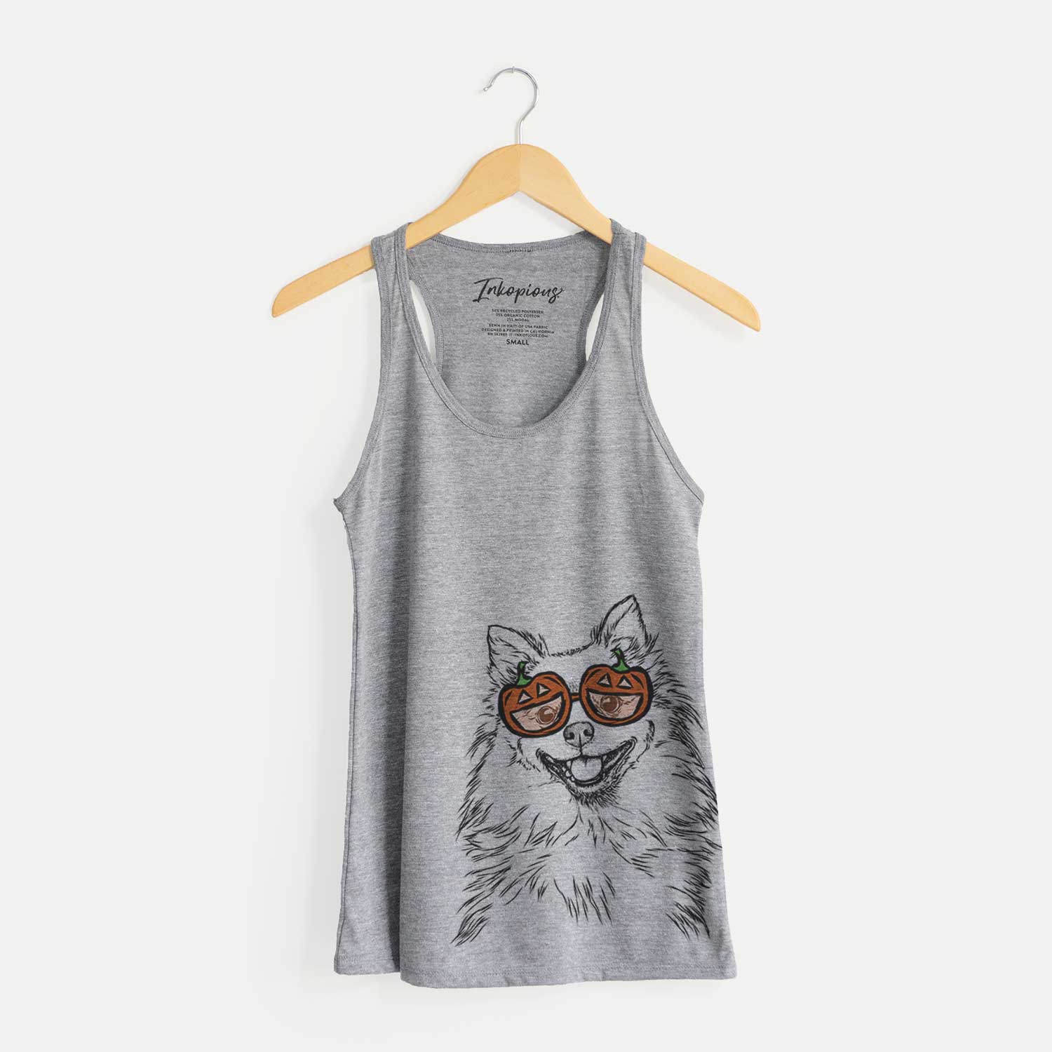 Hand-drawn sketch of Fibi the Spitz wearing pumpkin glasses on a Grey pumpkin collection