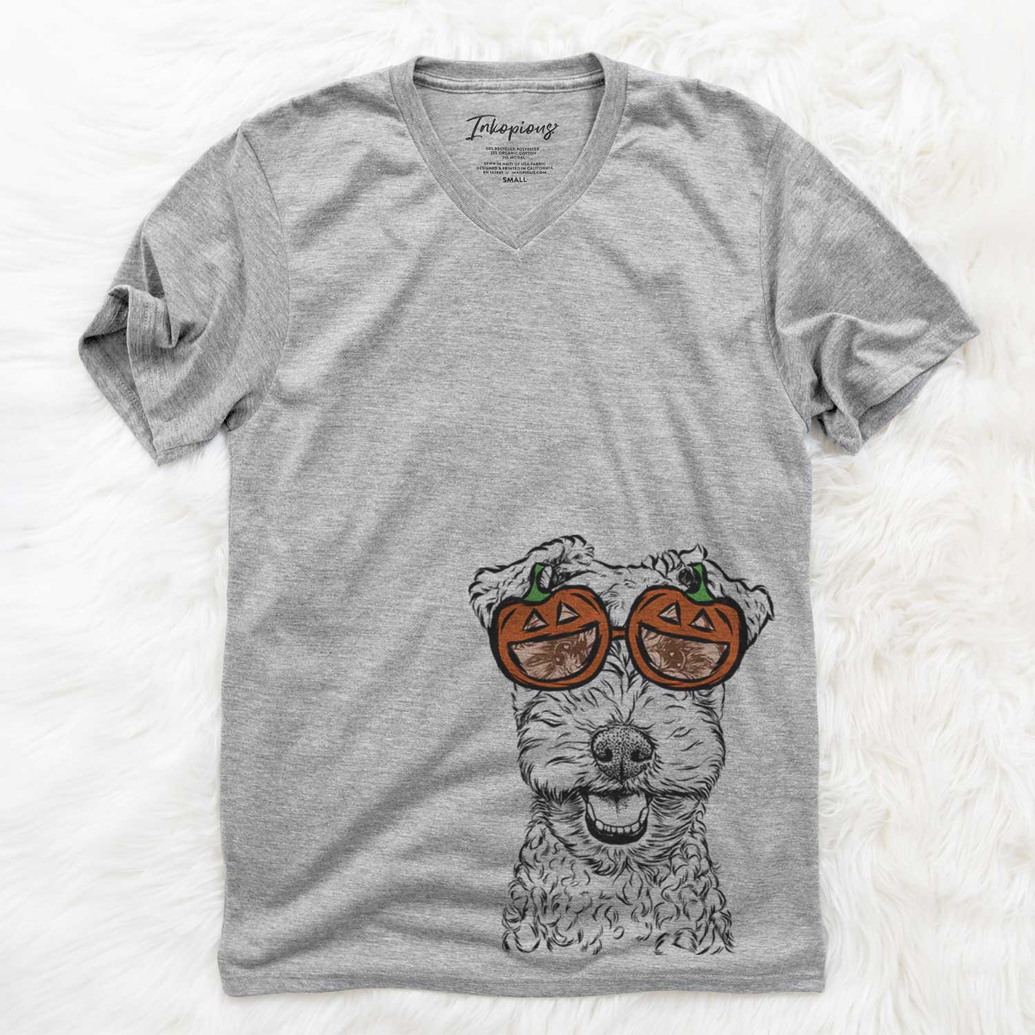 Hand-drawn sketch of Fintan the Irish Troodle wearing pumpkin glasses on a Grey pumpkin collection