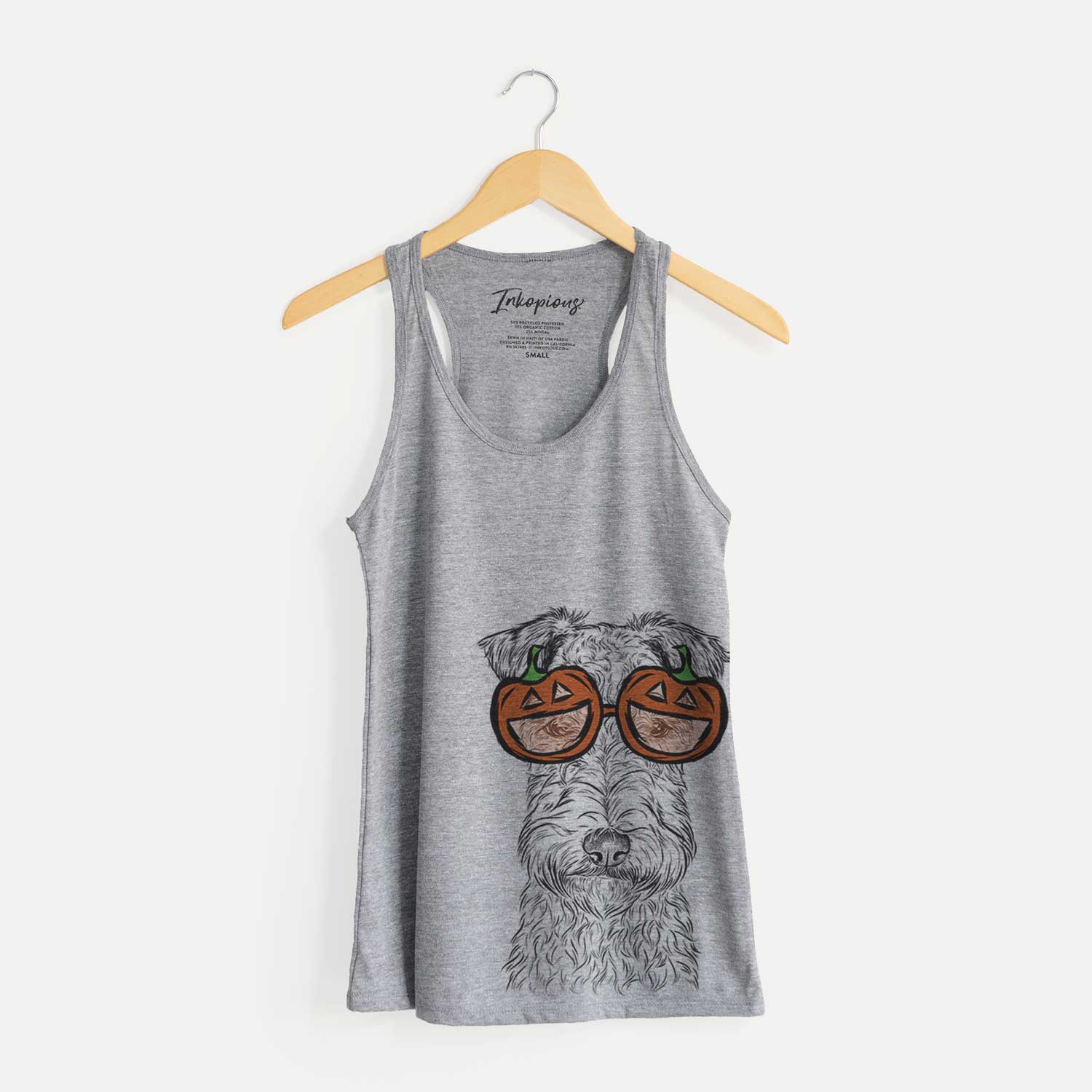 Hand-drawn sketch of Frida the Lakeland Terrier wearing pumpkin glasses on a Grey pumpkin collection