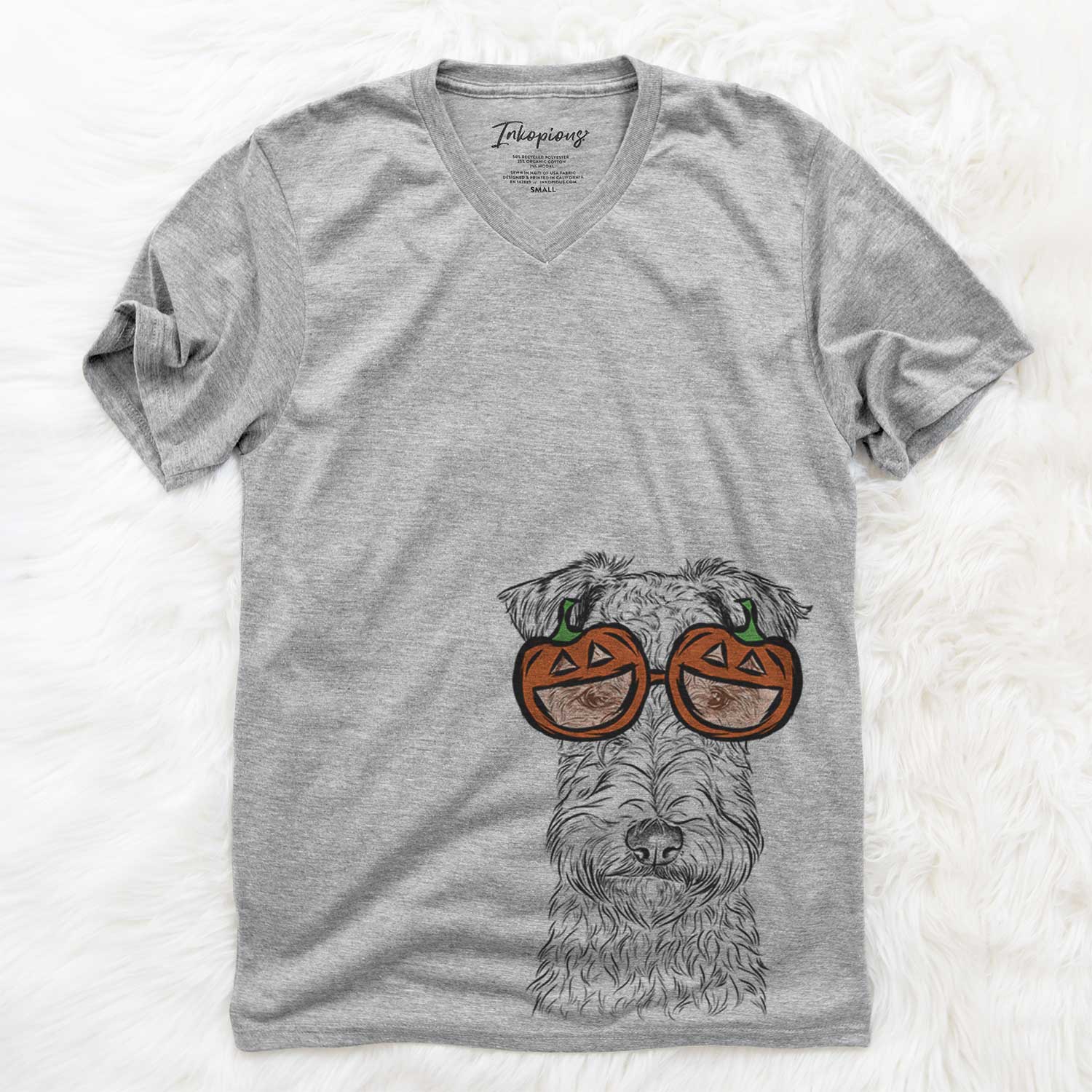 Hand-drawn sketch of Frida the Lakeland Terrier wearing pumpkin glasses on a Grey pumpkin collection