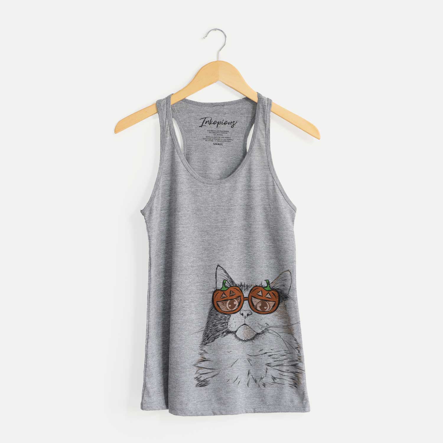 Hand-drawn sketch of Greta the Calico Cat wearing pumpkin glasses on a Grey pumpkin collection