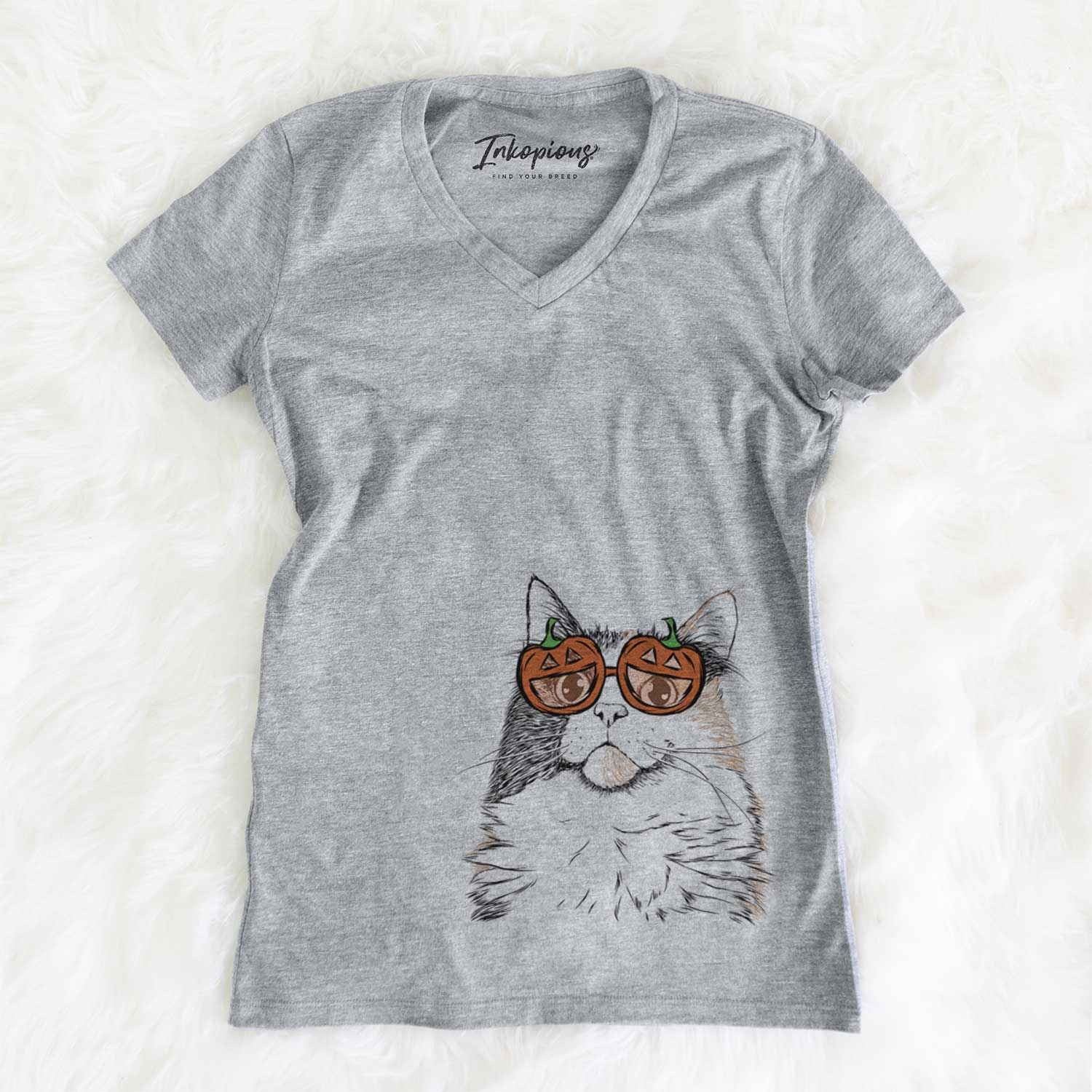 Hand-drawn sketch of Greta the Calico Cat wearing pumpkin glasses on a Grey pumpkin collection