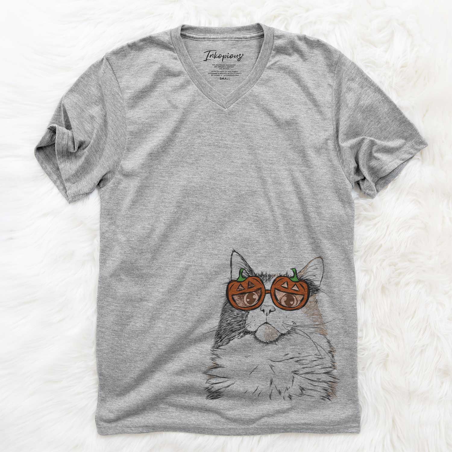 Hand-drawn sketch of Greta the Calico Cat wearing pumpkin glasses on a Grey pumpkin collection