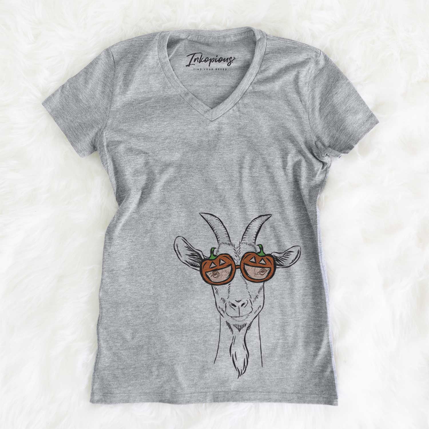Hand-drawn sketch of Gunnar the Goat wearing pumpkin glasses on a Grey pumpkin collection