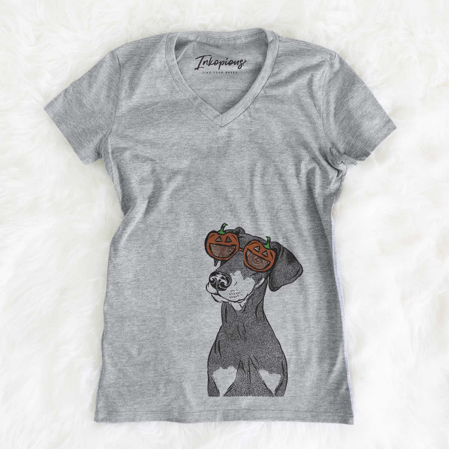 Hand-drawn sketch of Iroh the Doberman Pinscher wearing pumpkin glasses on a Grey pumpkin collection