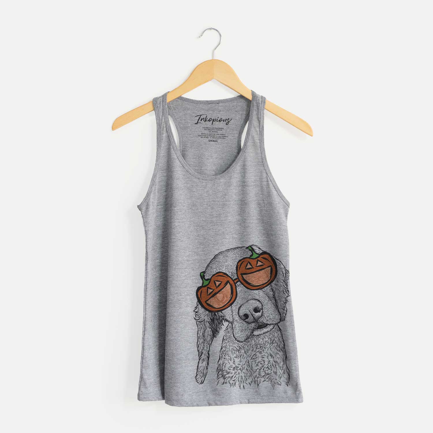 Hand-drawn sketch of Mambo #5 the Cocker Spaniel wearing pumpkin glasses on a Grey pumpkin collection