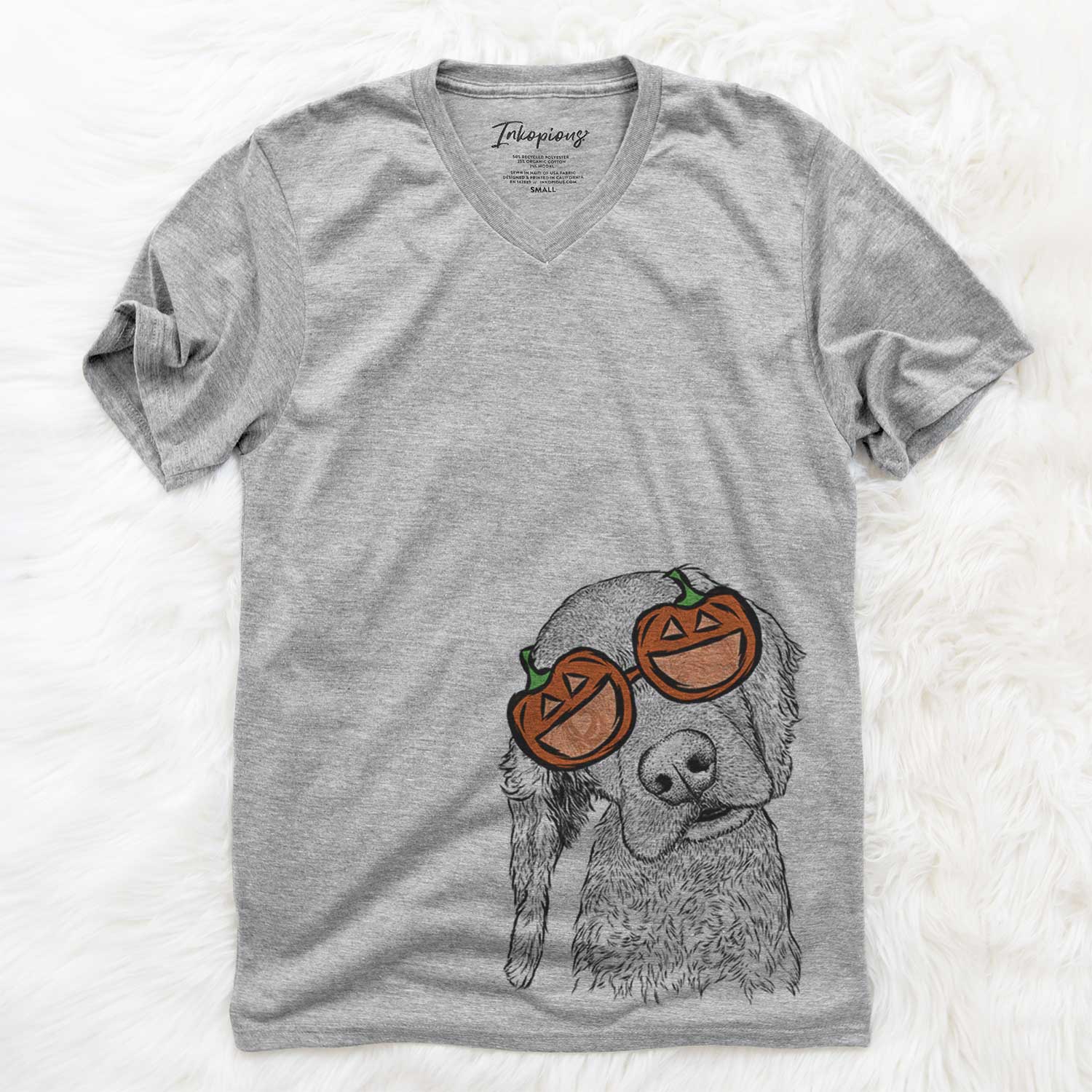 Hand-drawn sketch of Mambo #5 the Cocker Spaniel wearing pumpkin glasses on a Grey pumpkin collection
