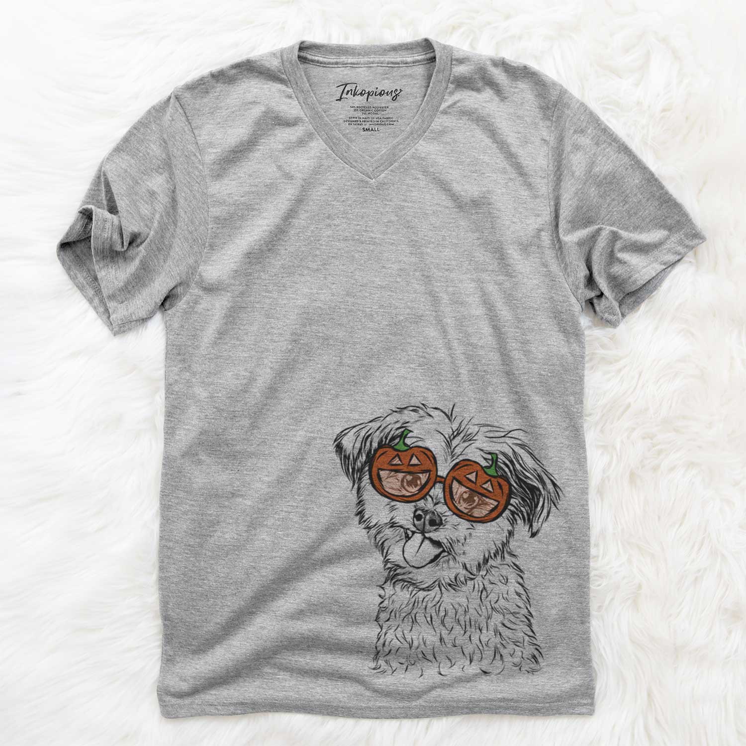 Hand-drawn sketch of Puff the Malshi wearing pumpkin glasses on a Grey pumpkin collection