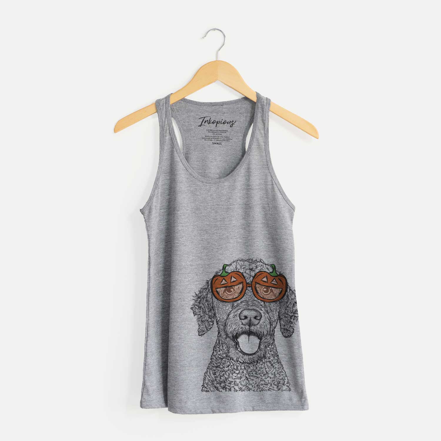 Hand-drawn sketch of Reina the Spanish Water Dog wearing pumpkin glasses on a Grey pumpkin collection