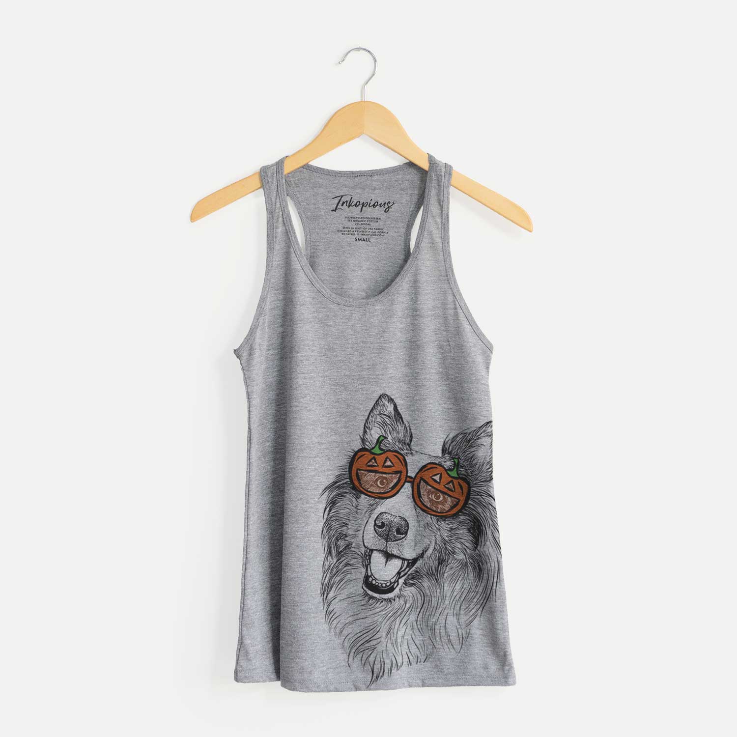Hand-drawn sketch of Skylar the Shetland Sheepdog wearing pumpkin glasses on a Grey pumpkin collection