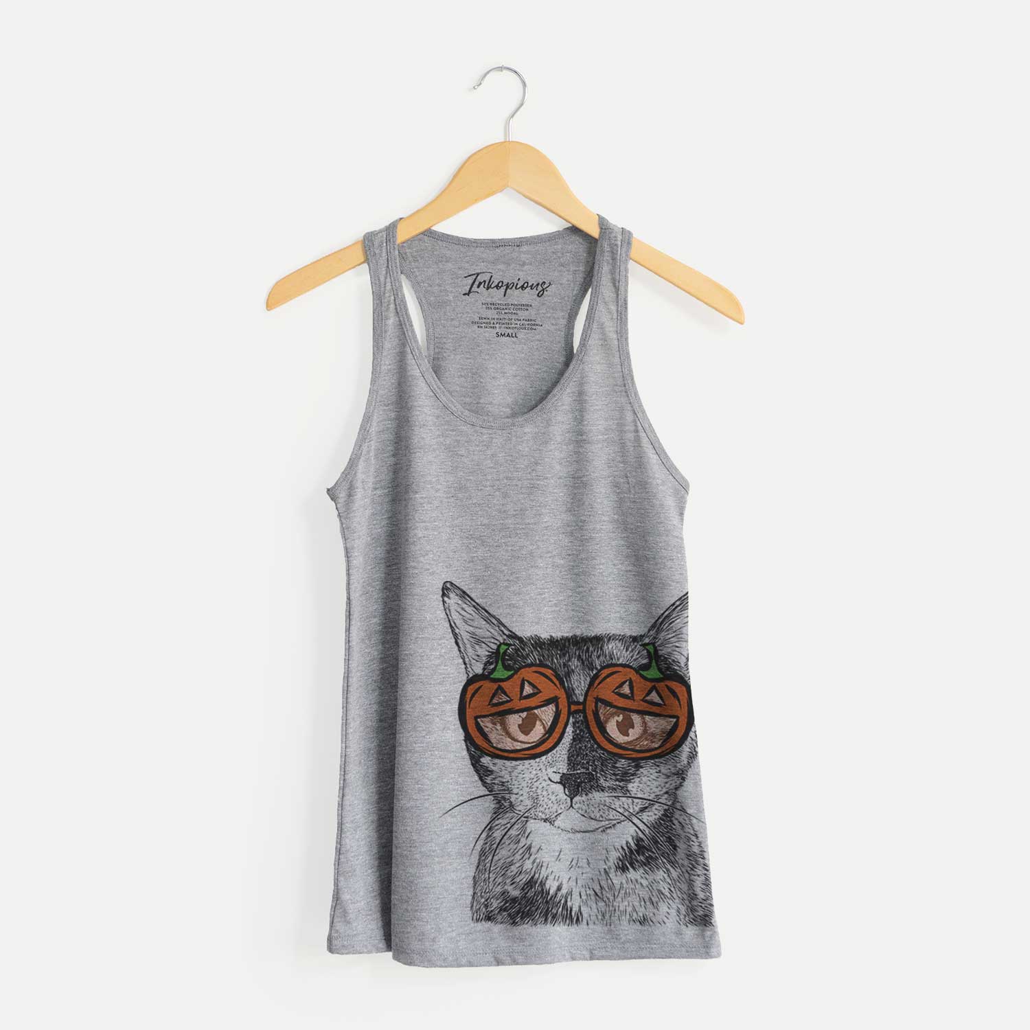 Hand-drawn sketch of Spooky Kitty the Tortoiseshell Cat wearing pumpkin glasses on a Grey pumpkin collection