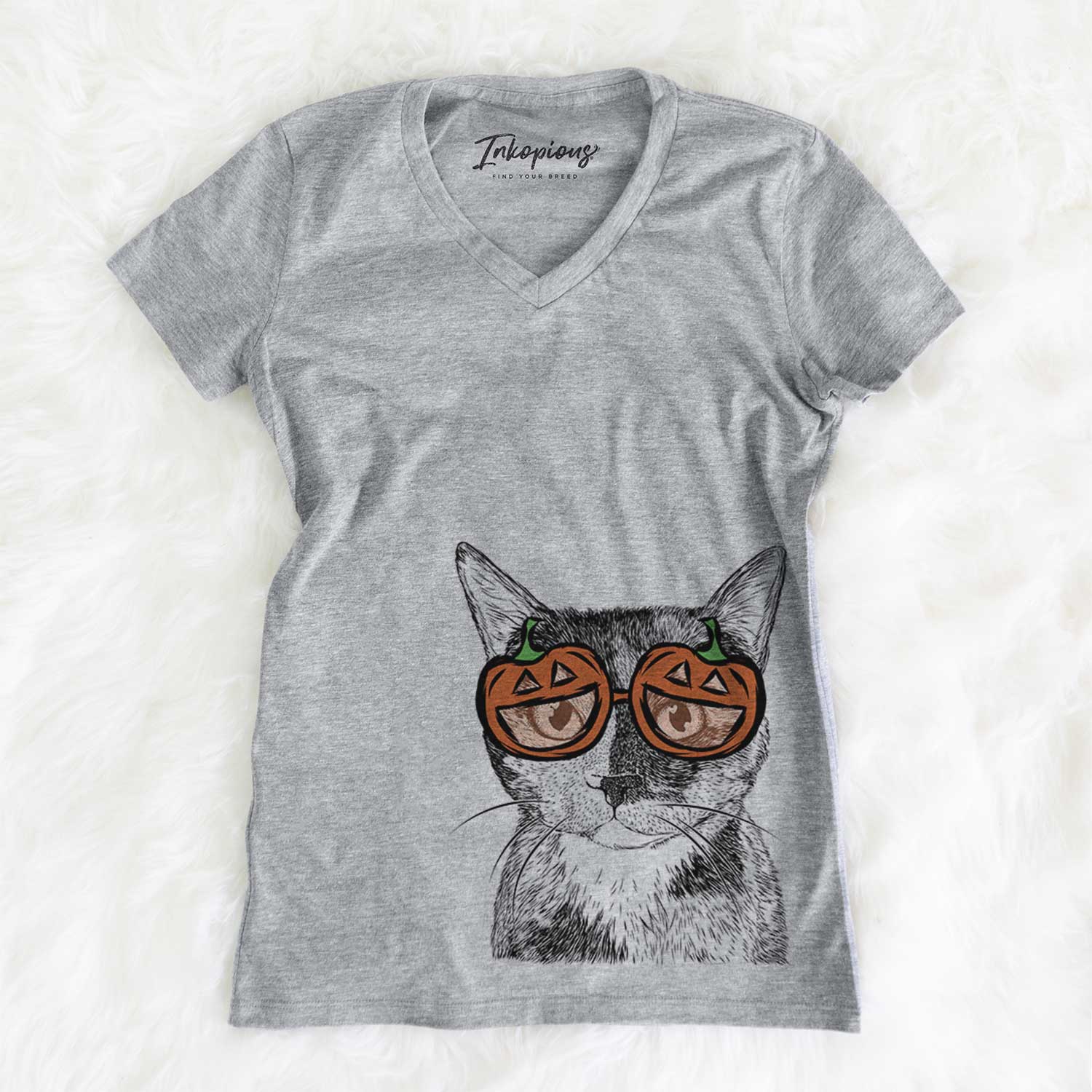 Hand-drawn sketch of Spooky Kitty the Tortoiseshell Cat wearing pumpkin glasses on a Grey pumpkin collection