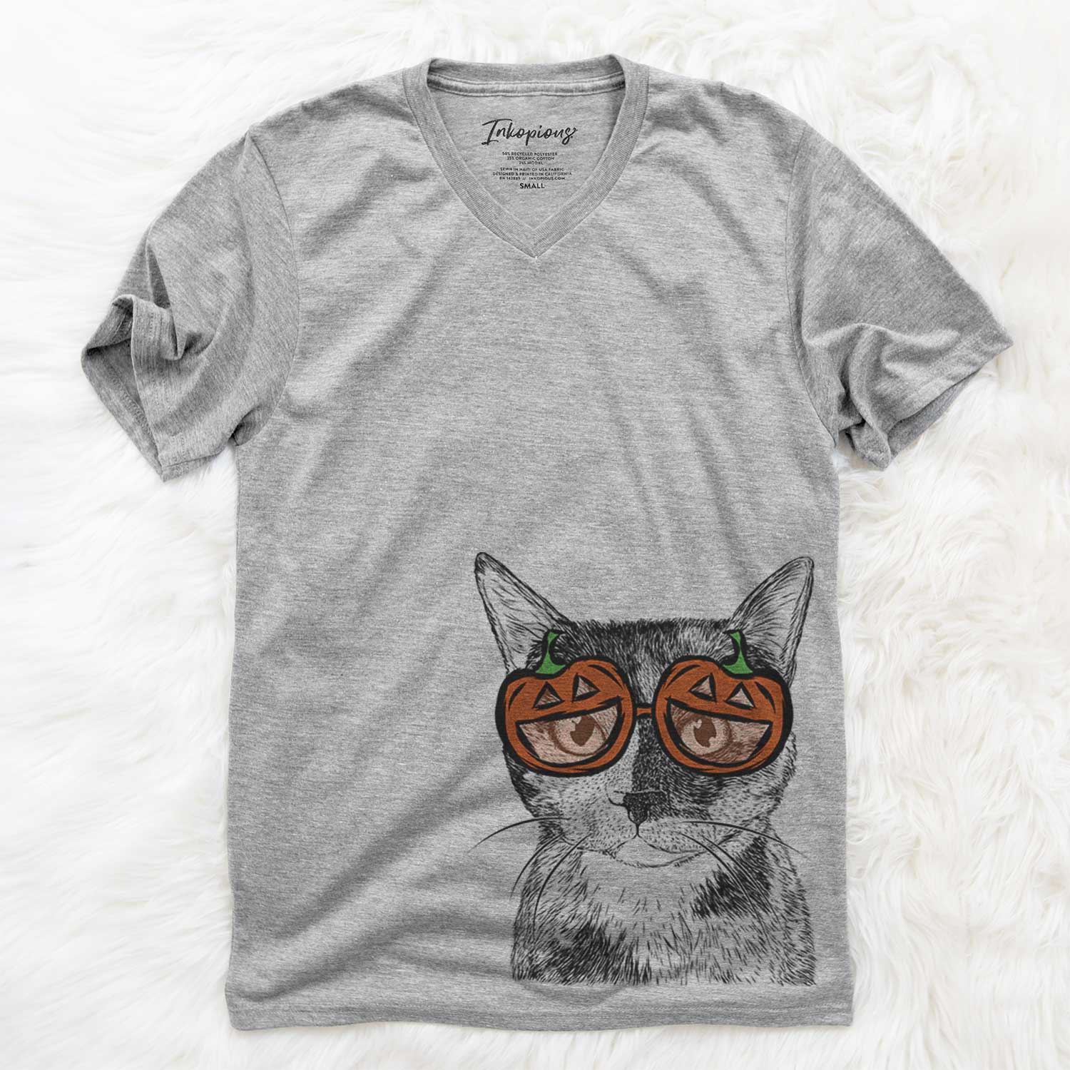 Hand-drawn sketch of Spooky Kitty the Tortoiseshell Cat wearing pumpkin glasses on a Grey pumpkin collection