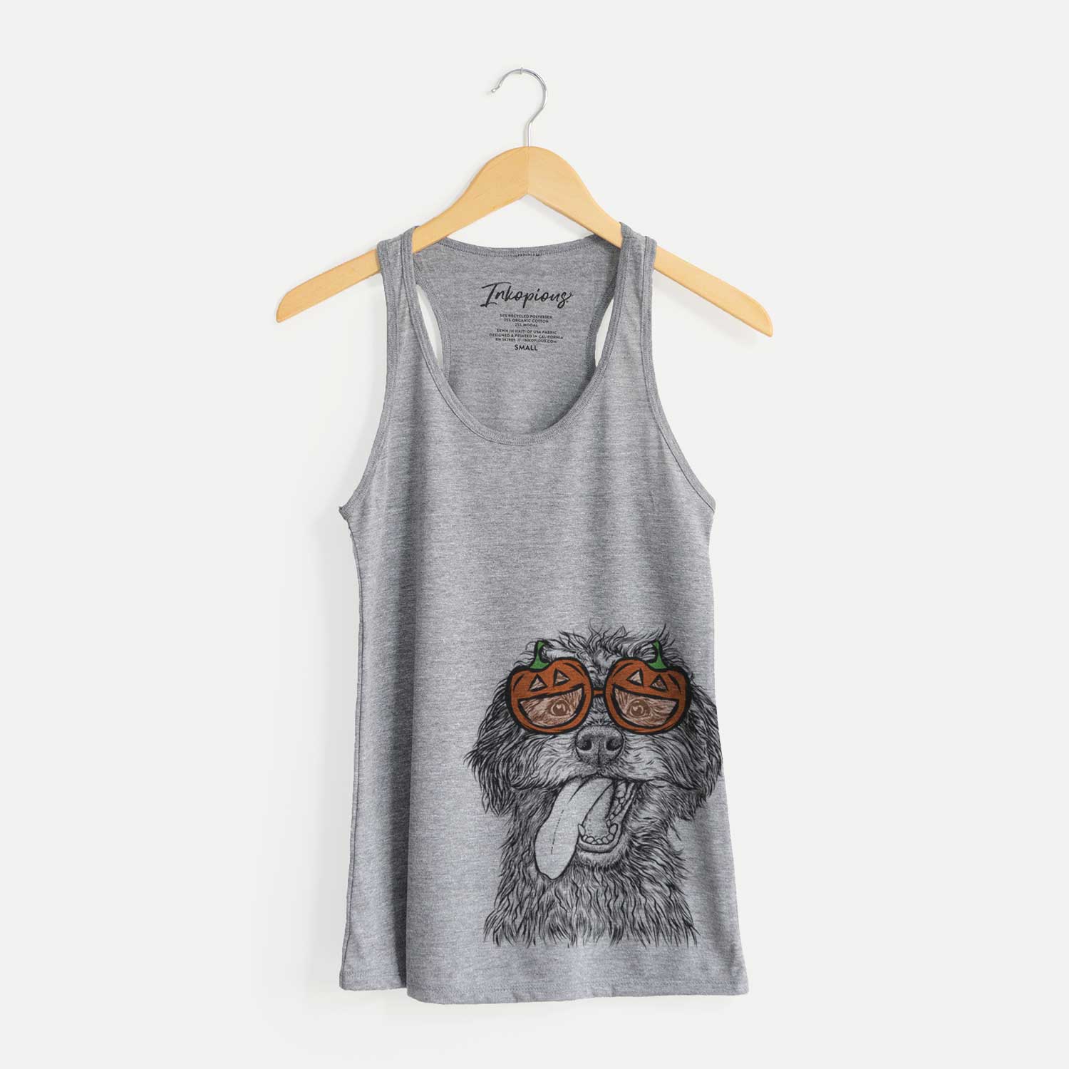 Hand-drawn sketch of Winnie the Mini Aussiedoodle wearing pumpkin glasses on a Grey pumpkin collection