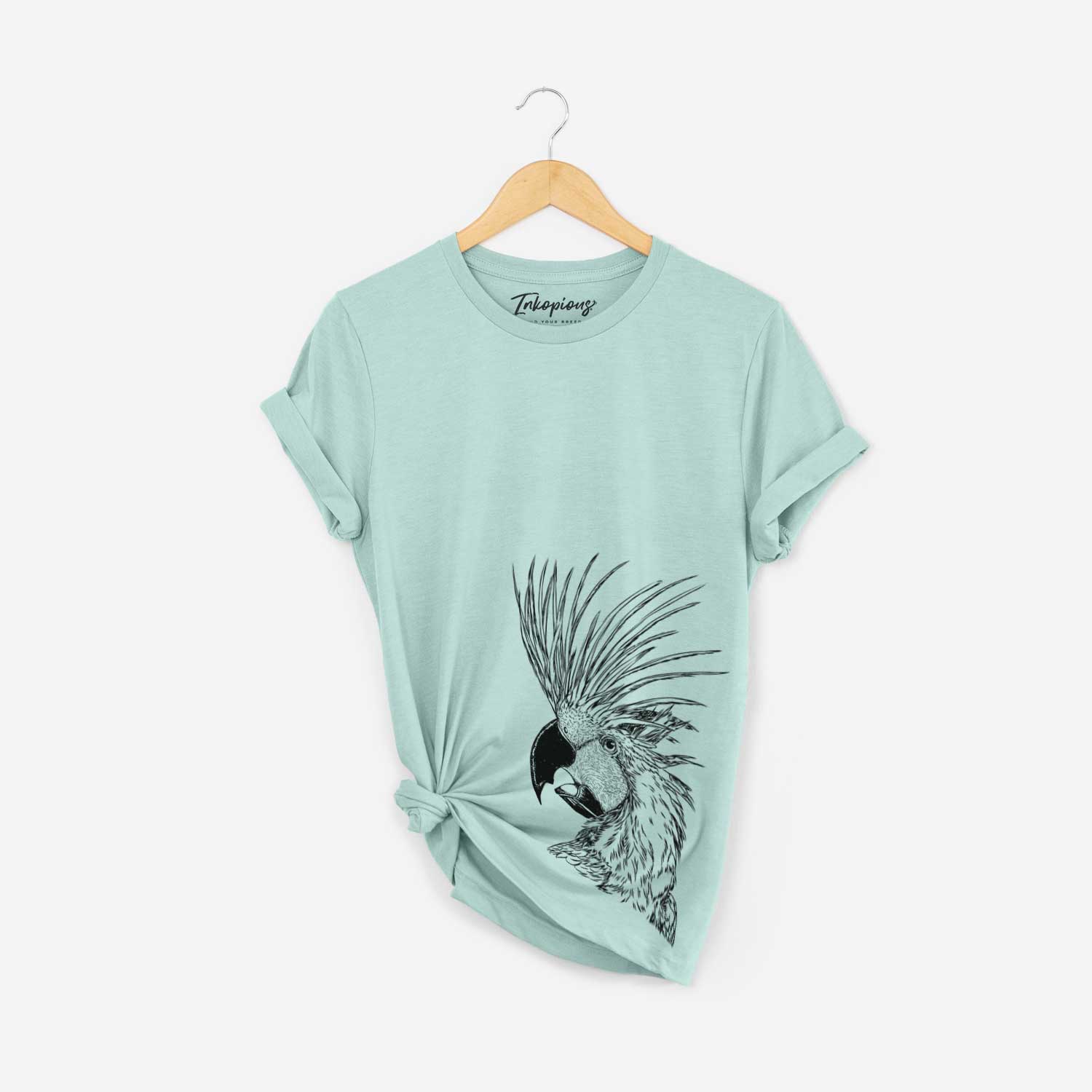 Side-profile sketch of a Palm Cockatoo on a Heather Sage Unisex crewneck