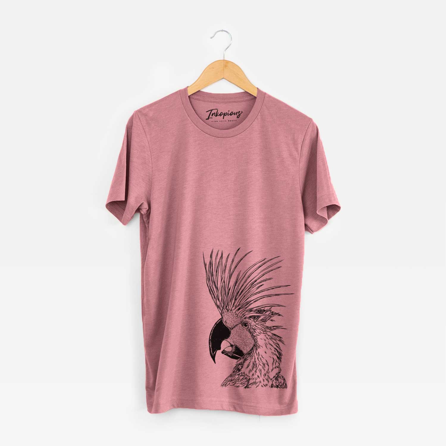 Side-profile sketch of a Palm Cockatoo on a Mauve Unisex crewneck