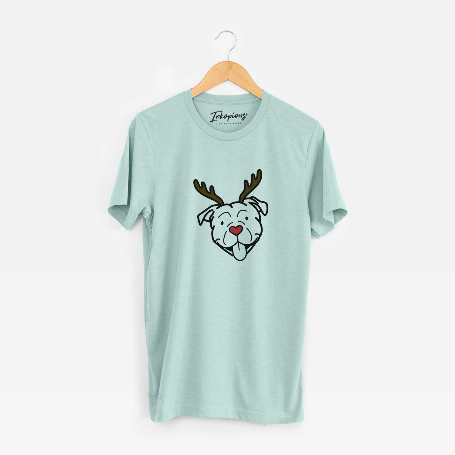 Minimalist line drawing of an American Bulldog with reindeer antlers and a red nose on a Heather Sage Unisex crewneck