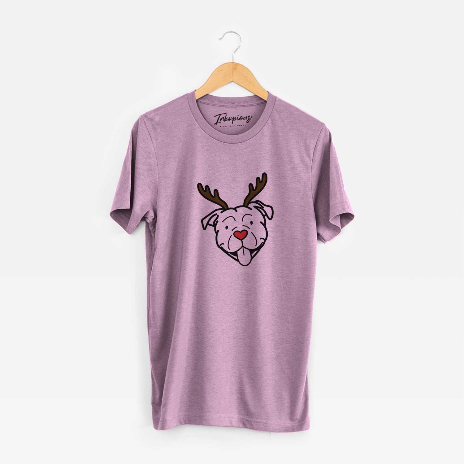 Minimalist line drawing of an American Bulldog with reindeer antlers and a red nose on an Orchid Unisex crewneck