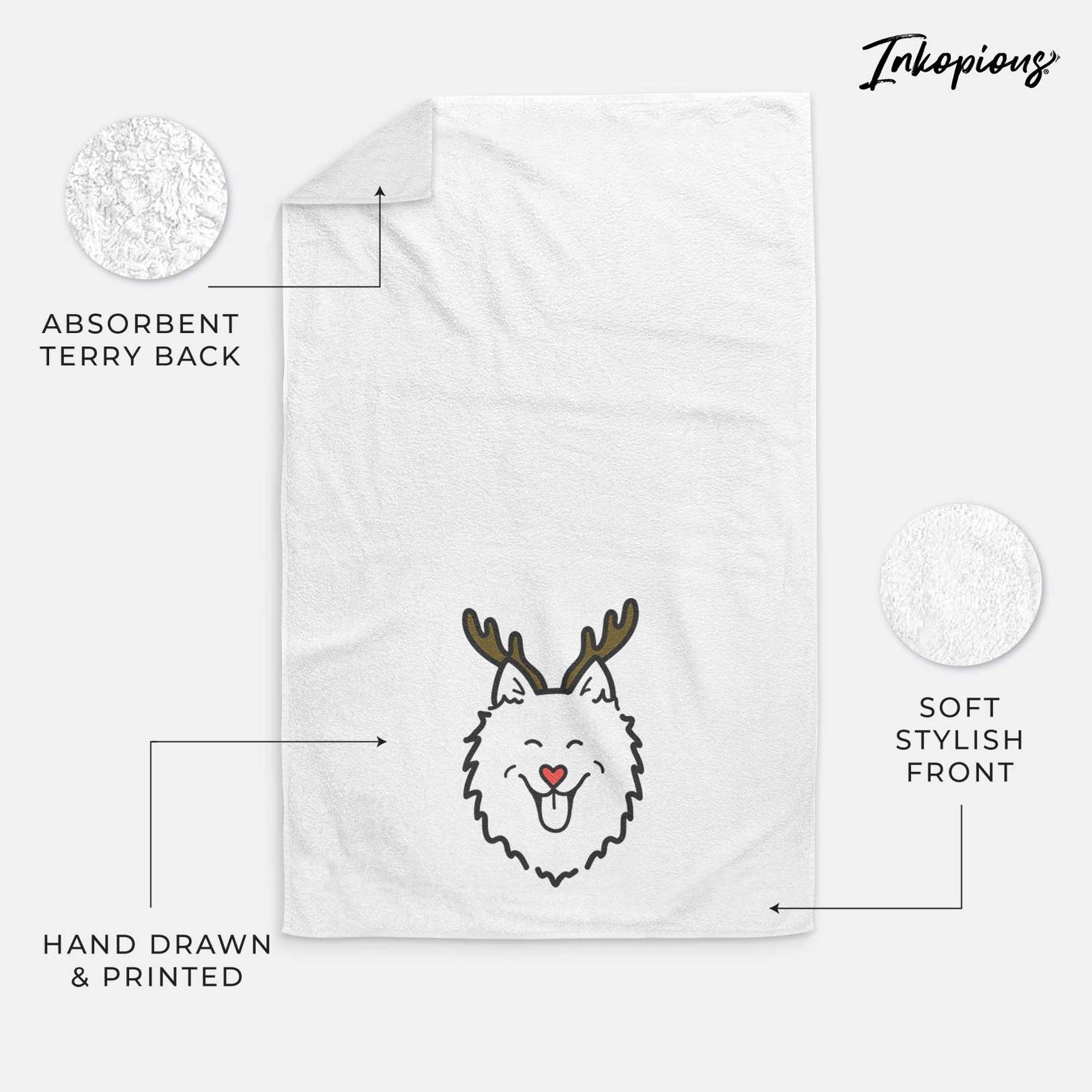 Minimalist line drawing of an American Eskimo with reindeer antlers and a red nose on a decorative hand towel