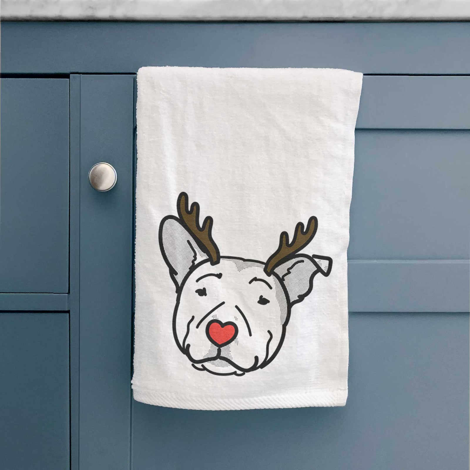 Minimalist line drawing of Archer the Pitbull with reindeer antlers and a red nose on a decorative hand towel