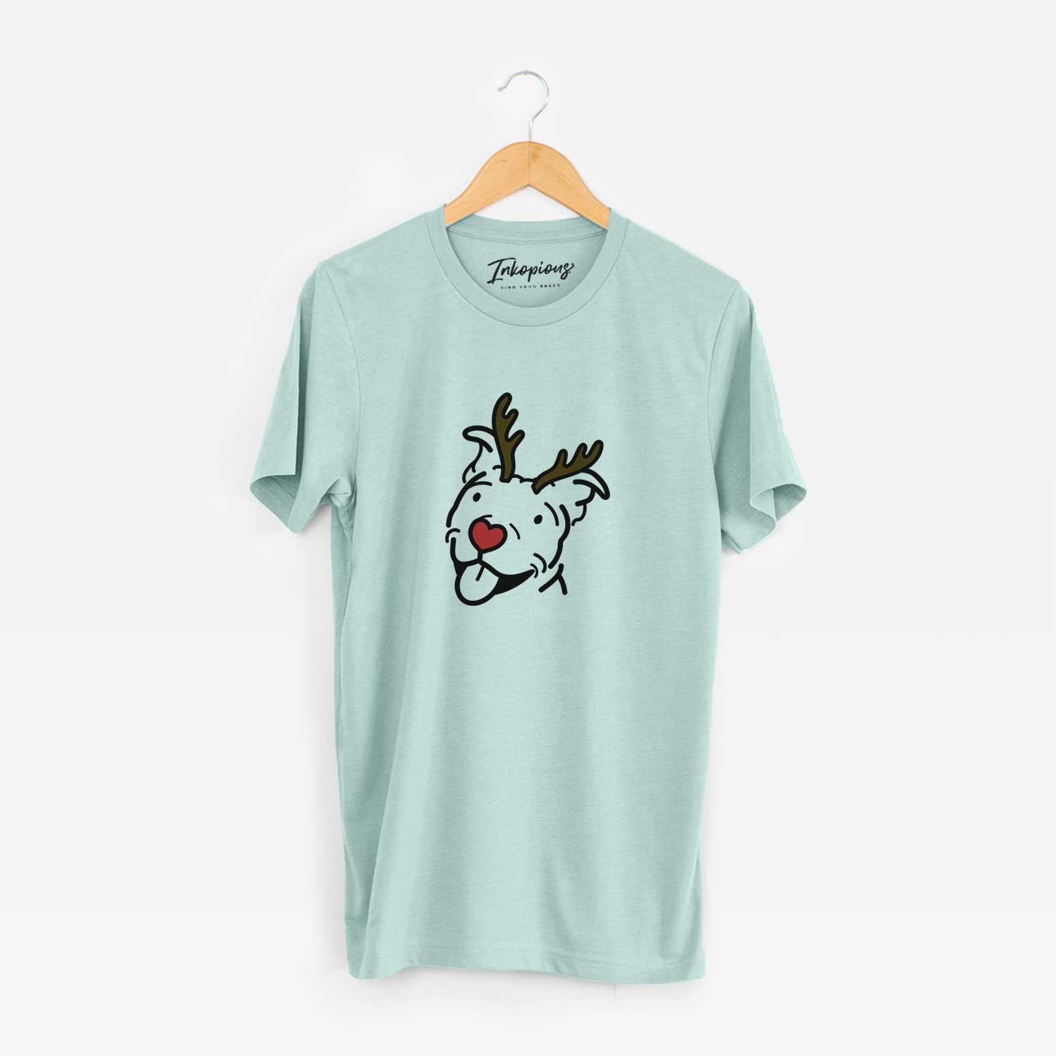 Minimalist line drawing of Arlo the Pitbull with reindeer antlers and a red nose on a Heather Sage Unisex crewneck