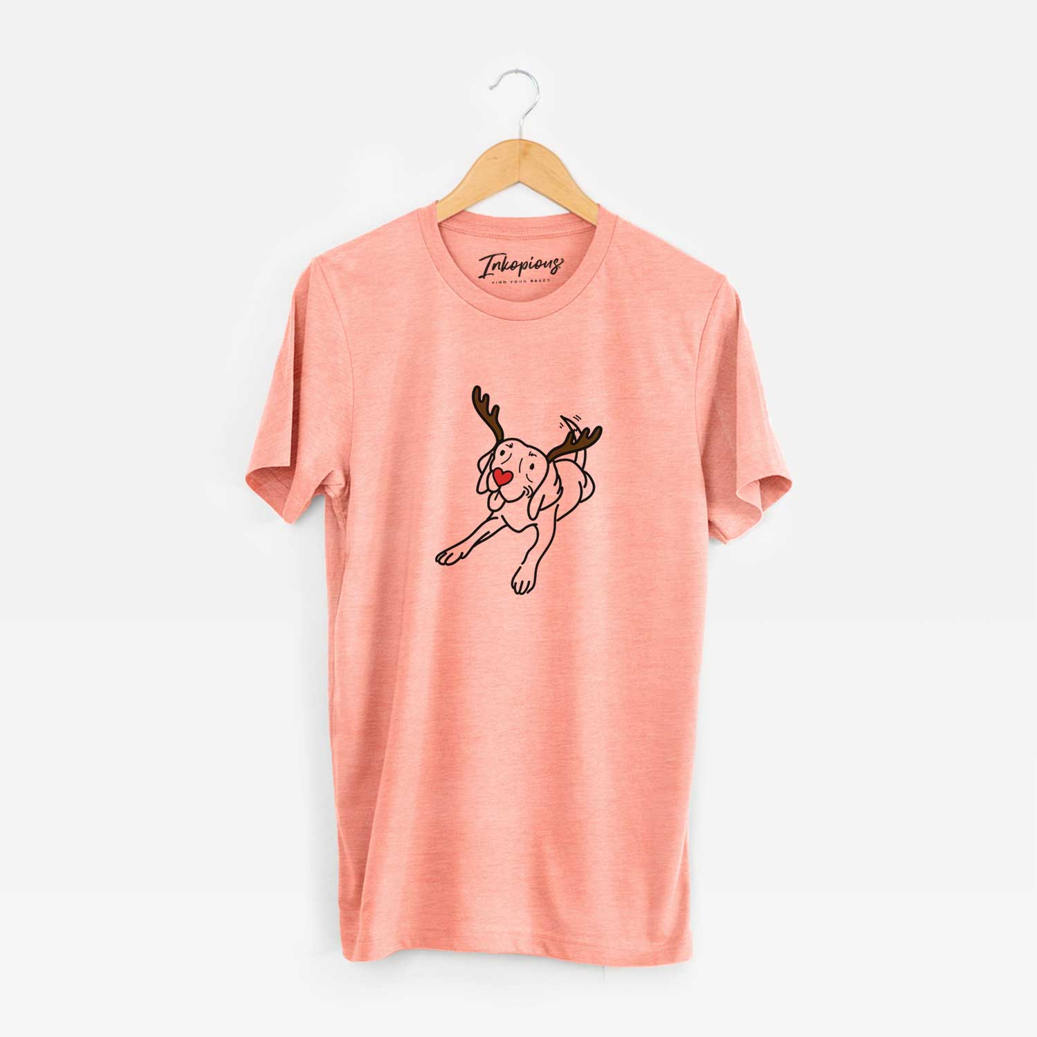 Minimalist line drawing of Bagel the Beagle with reindeer antlers and a red nose on a Sunset Unisex crewneck