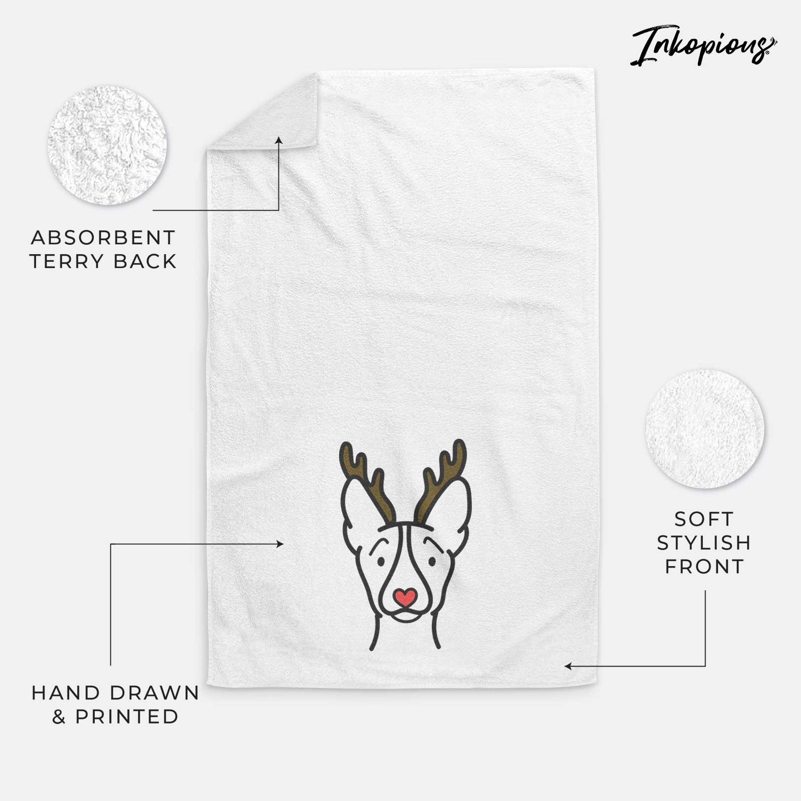 Minimalist line drawing of a Basenji with reindeer antlers and a red nose on a decorative hand towel