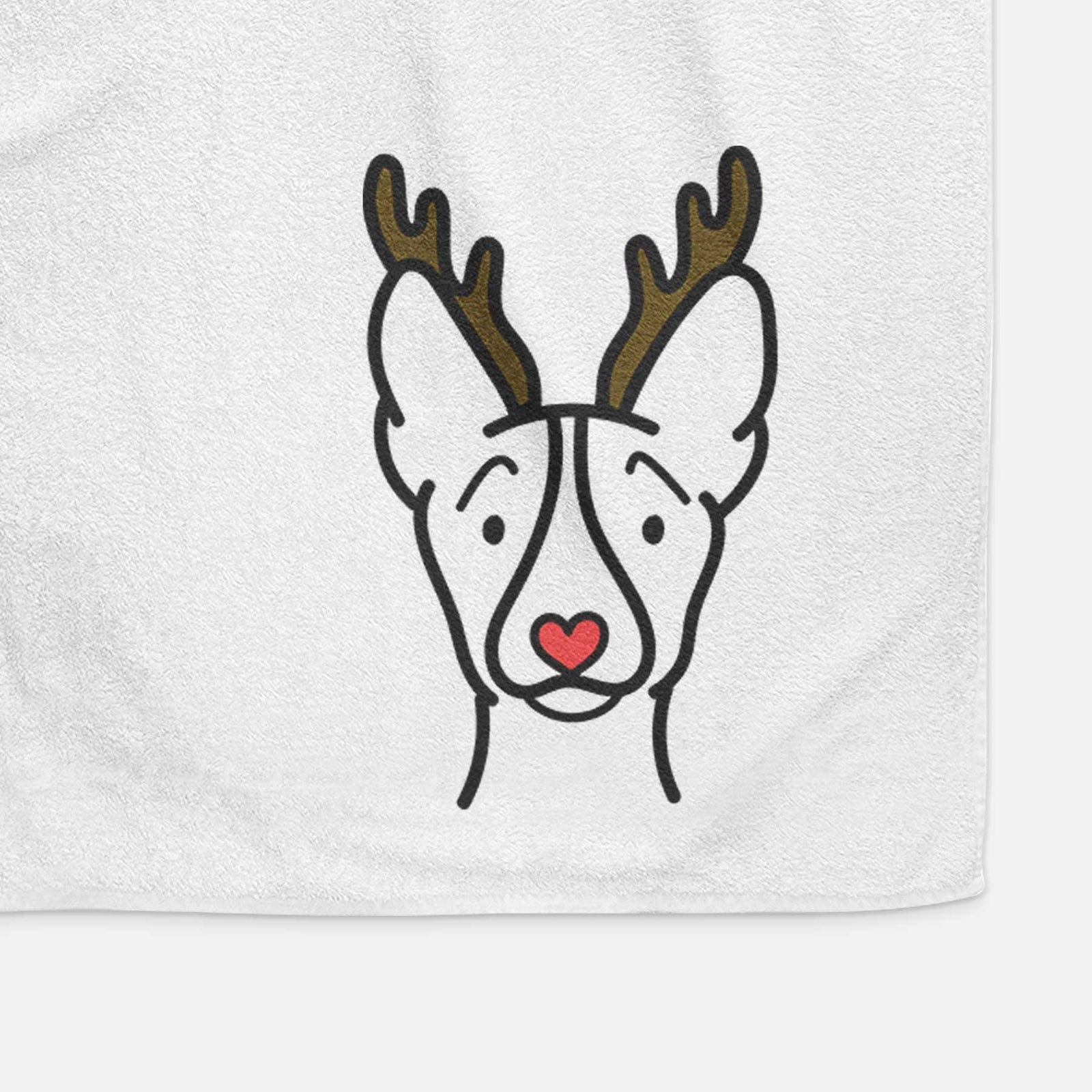 Minimalist line drawing of a Basenji with reindeer antlers and a red nose on a decorative hand towel