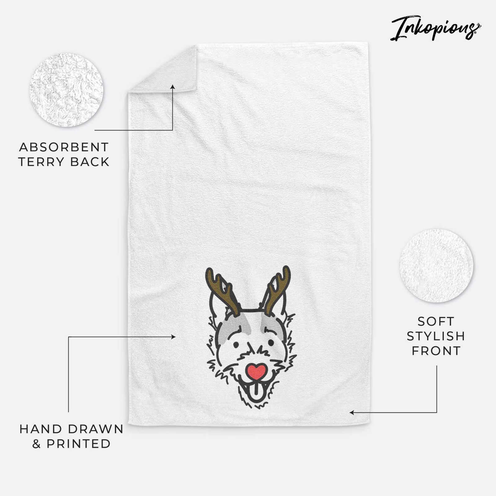 Minimalist line drawing of Baxter the Jack Russell Terrier with reindeer antlers and a red nose on a decorative hand towel