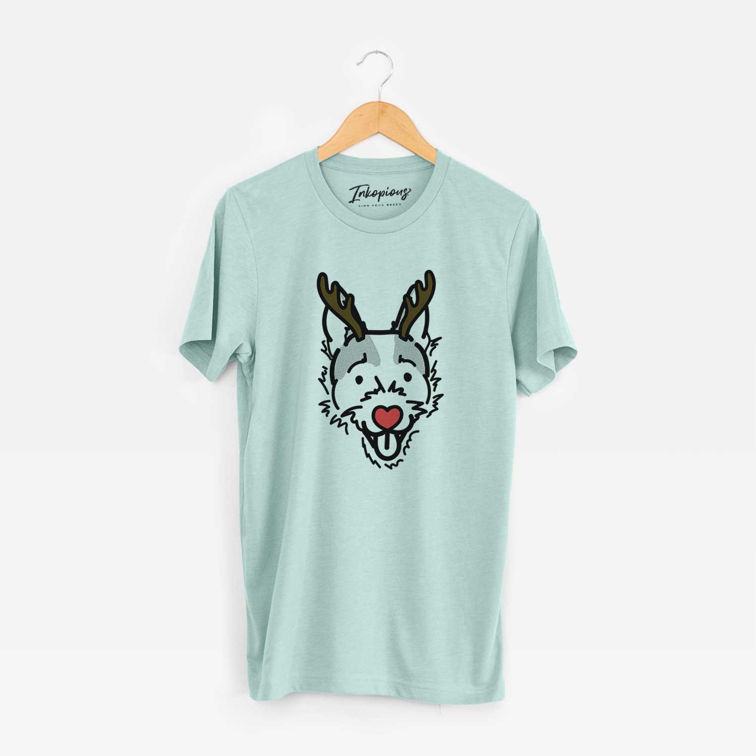 Minimalist line drawing of Baxter the Jack Russell Terrier with reindeer antlers and a red nose on a Heather Sage Unisex crewneck