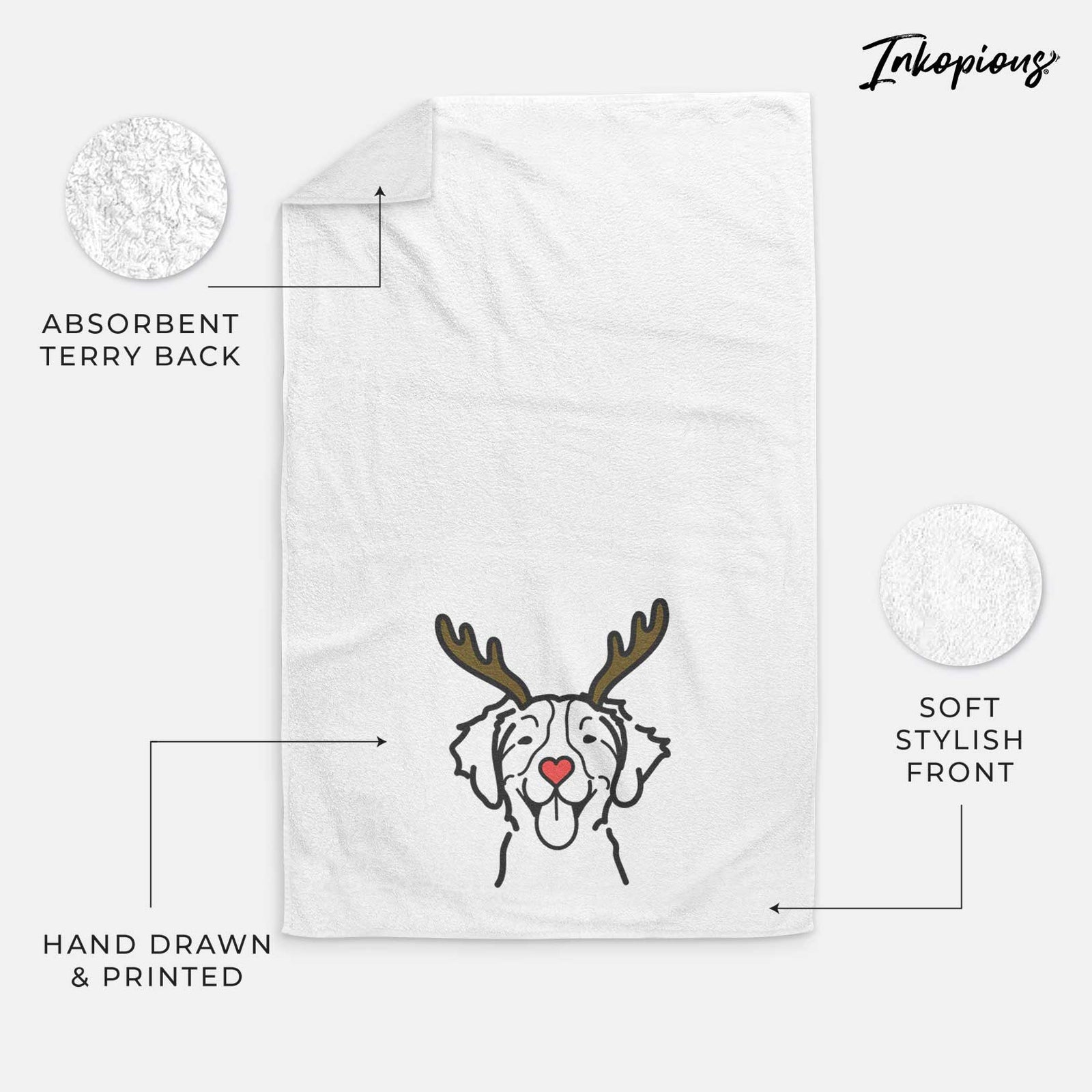 Minimalist line drawing of a Brittany with reindeer antlers and a red nose on a decorative hand towel