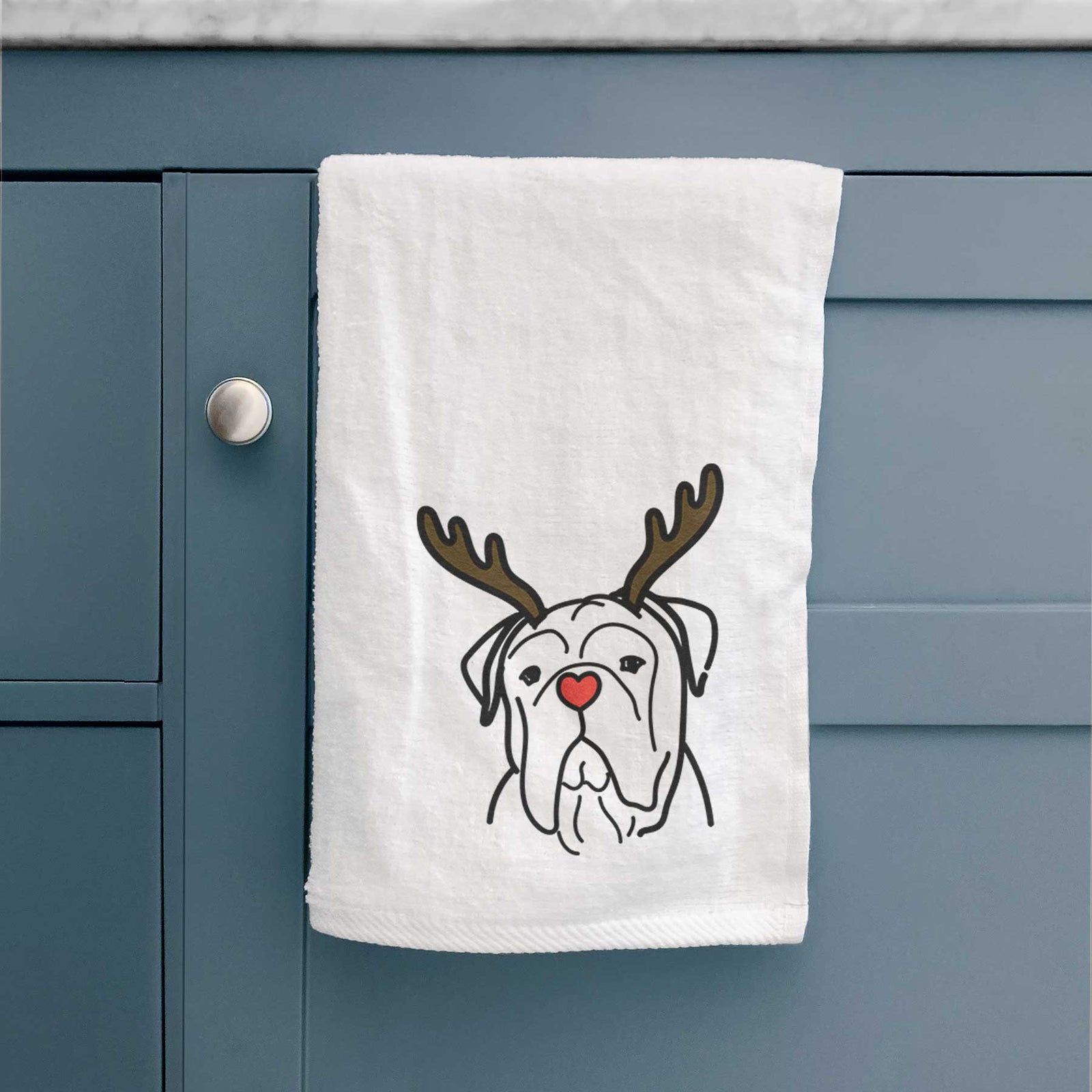 Minimalist line drawing of Vivian the Bull Mastiff with reindeer antlers and a red nose on a decorative hand towel
