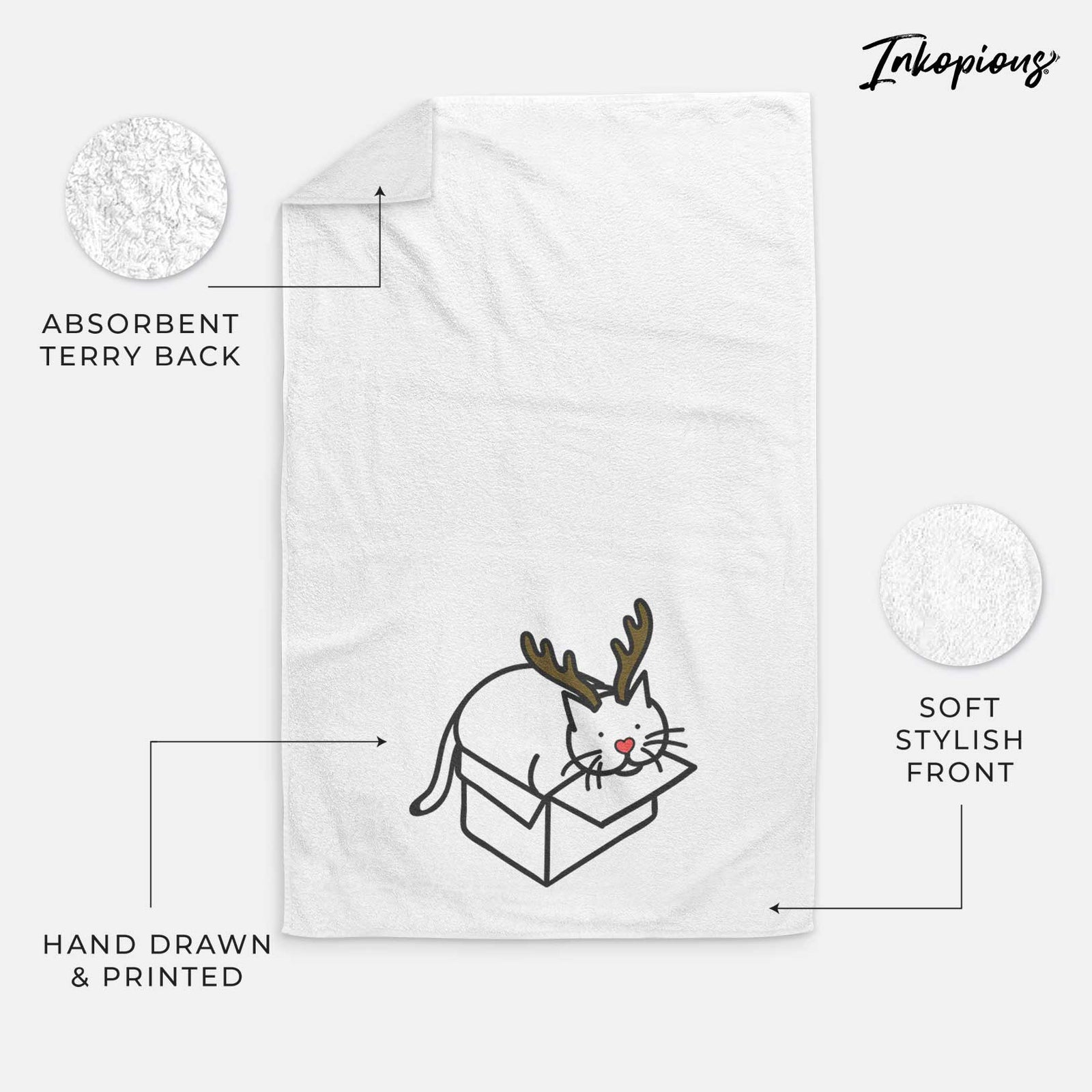 Minimalist line drawing of Charlie the Cat in a Box with reindeer antlers and a red nose on a decorative hand towel