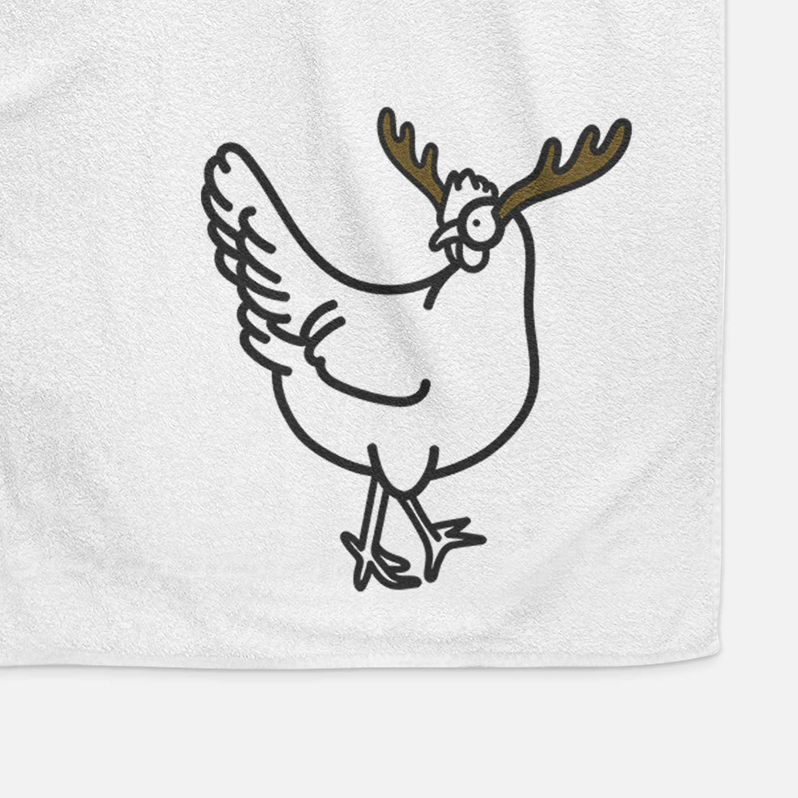 Minimalist line drawing of Daisy the Chicken with reindeer antlers and a red nose on a decorative hand towel