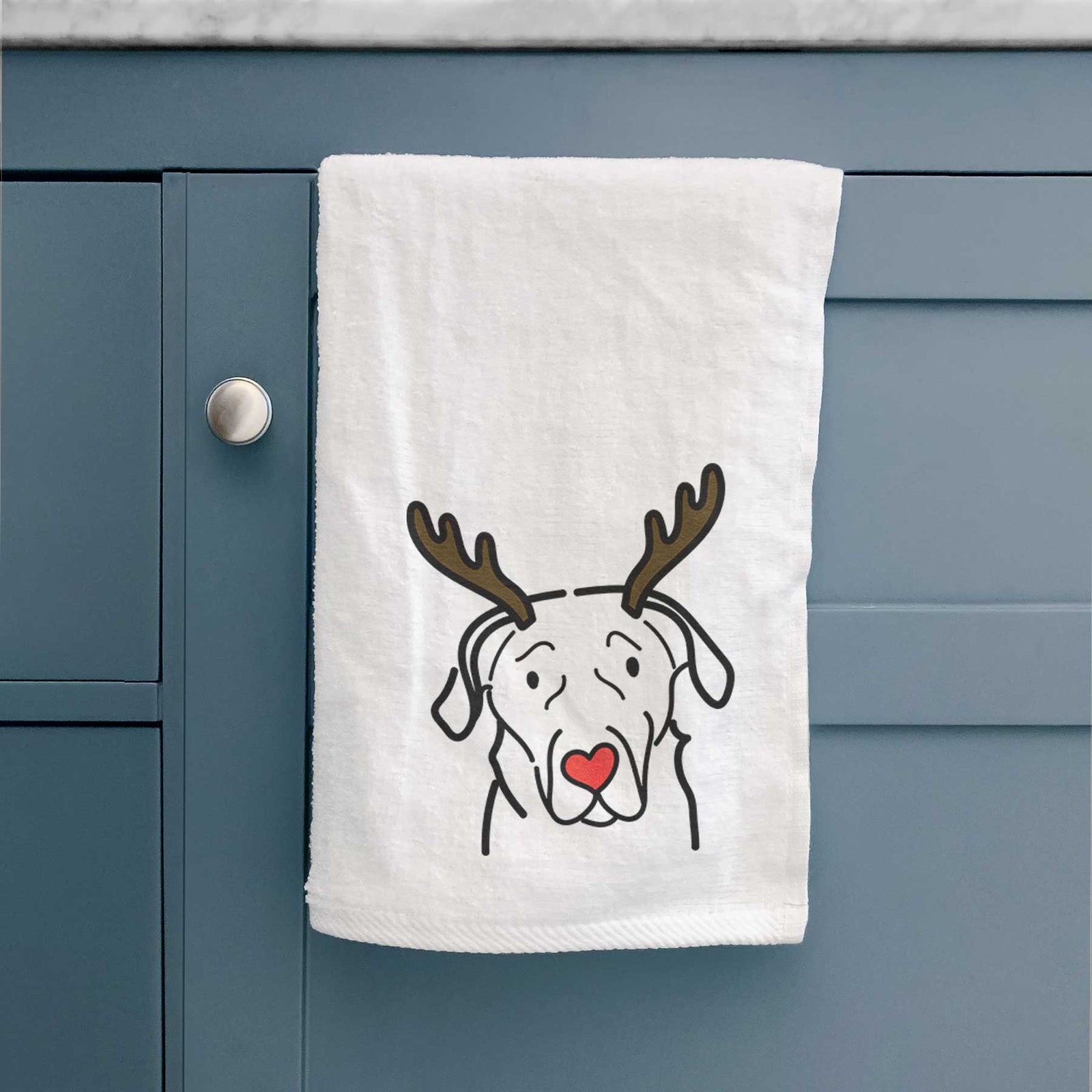 Minimalist line drawing of an English Labrador with reindeer antlers and a red nose on a decorative hand towel