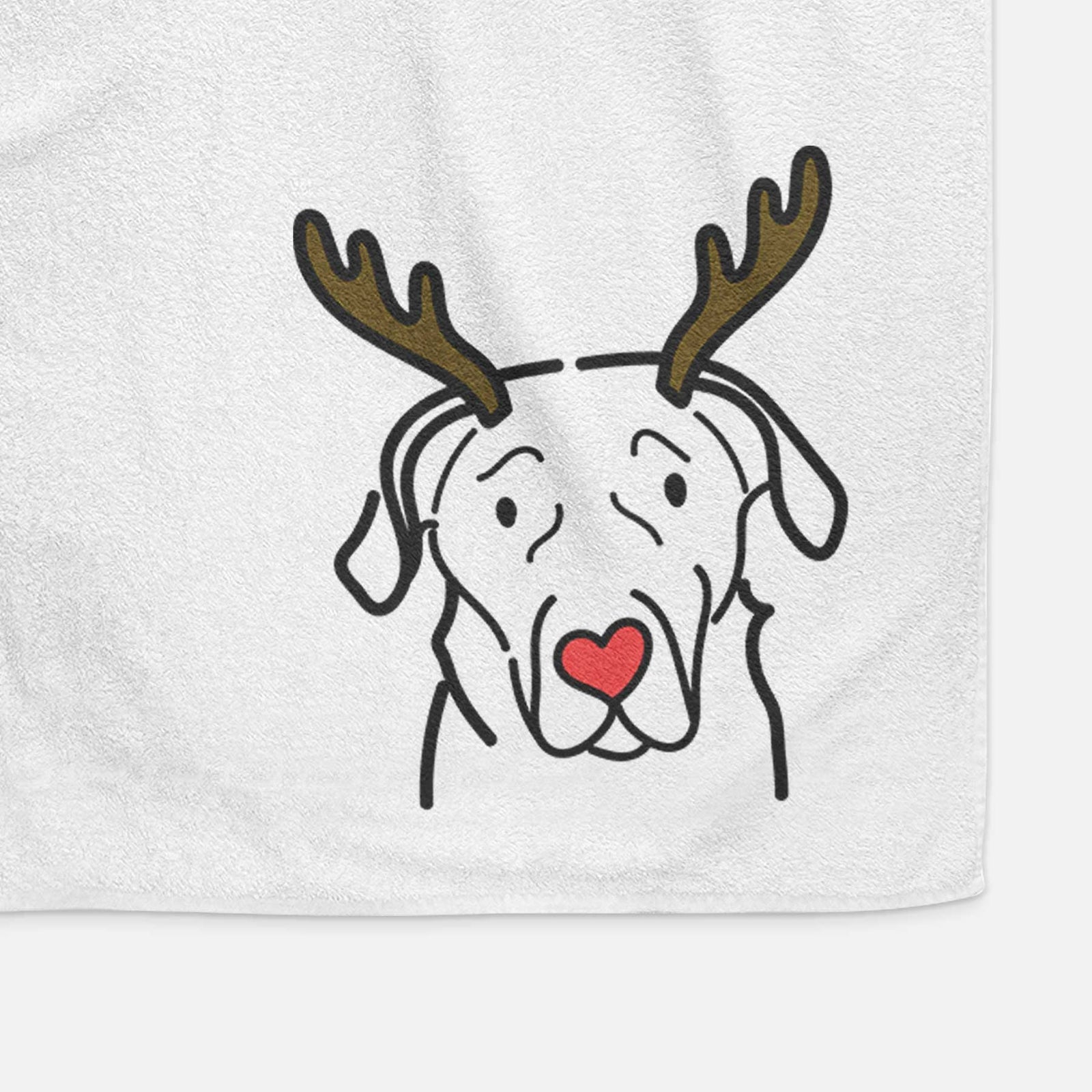 Minimalist line drawing of an English Labrador with reindeer antlers and a red nose on a decorative hand towel