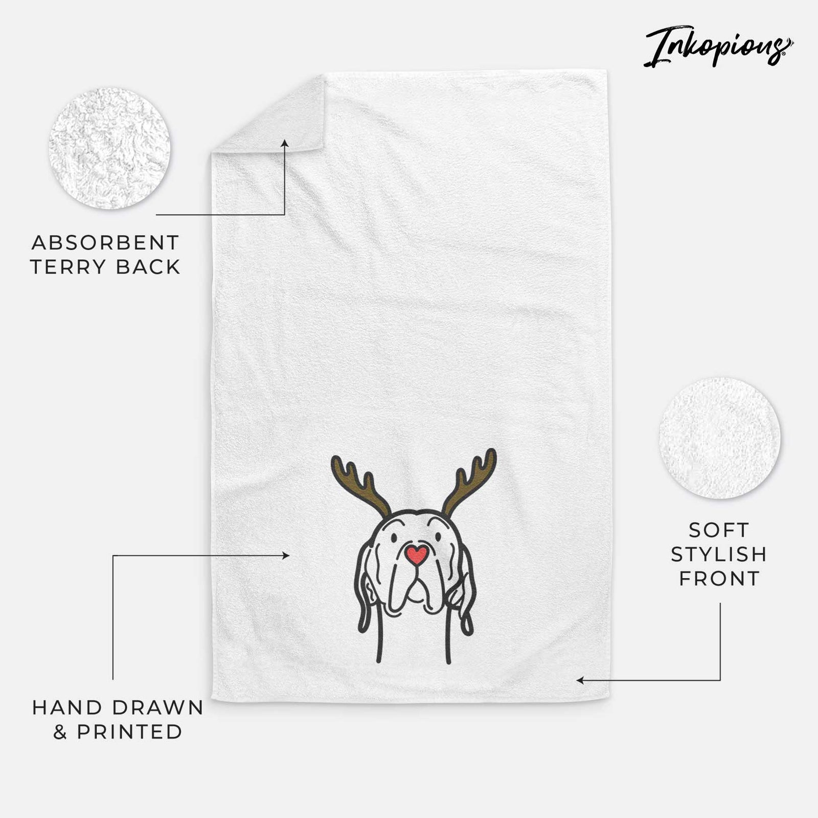 Minimalist line drawing of an English Pointer with reindeer antlers and a red nose on a decorative hand towel