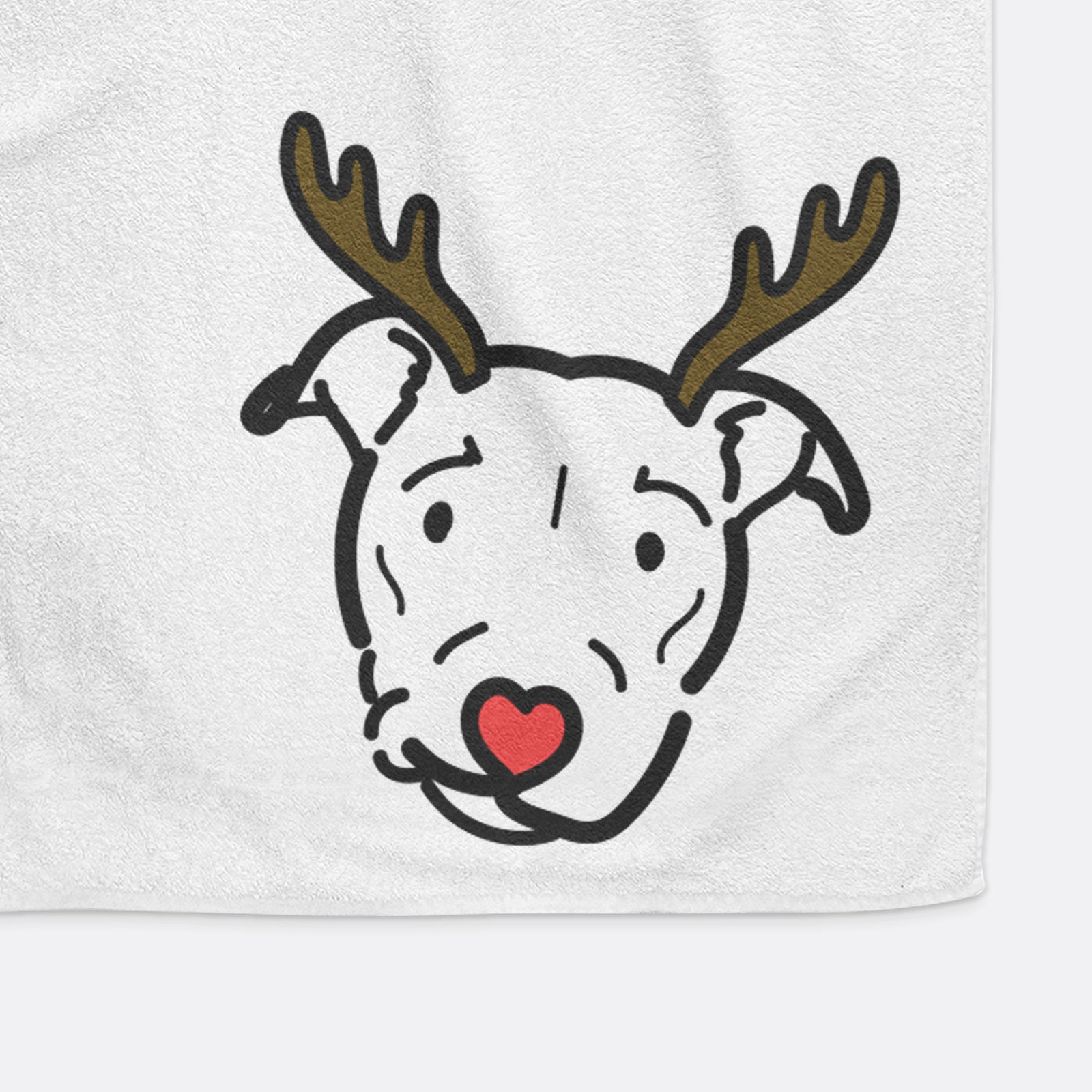 Minimalist line drawing of Ernie the Pitbull Mix with reindeer antlers and a red nose on a decorative hand towel