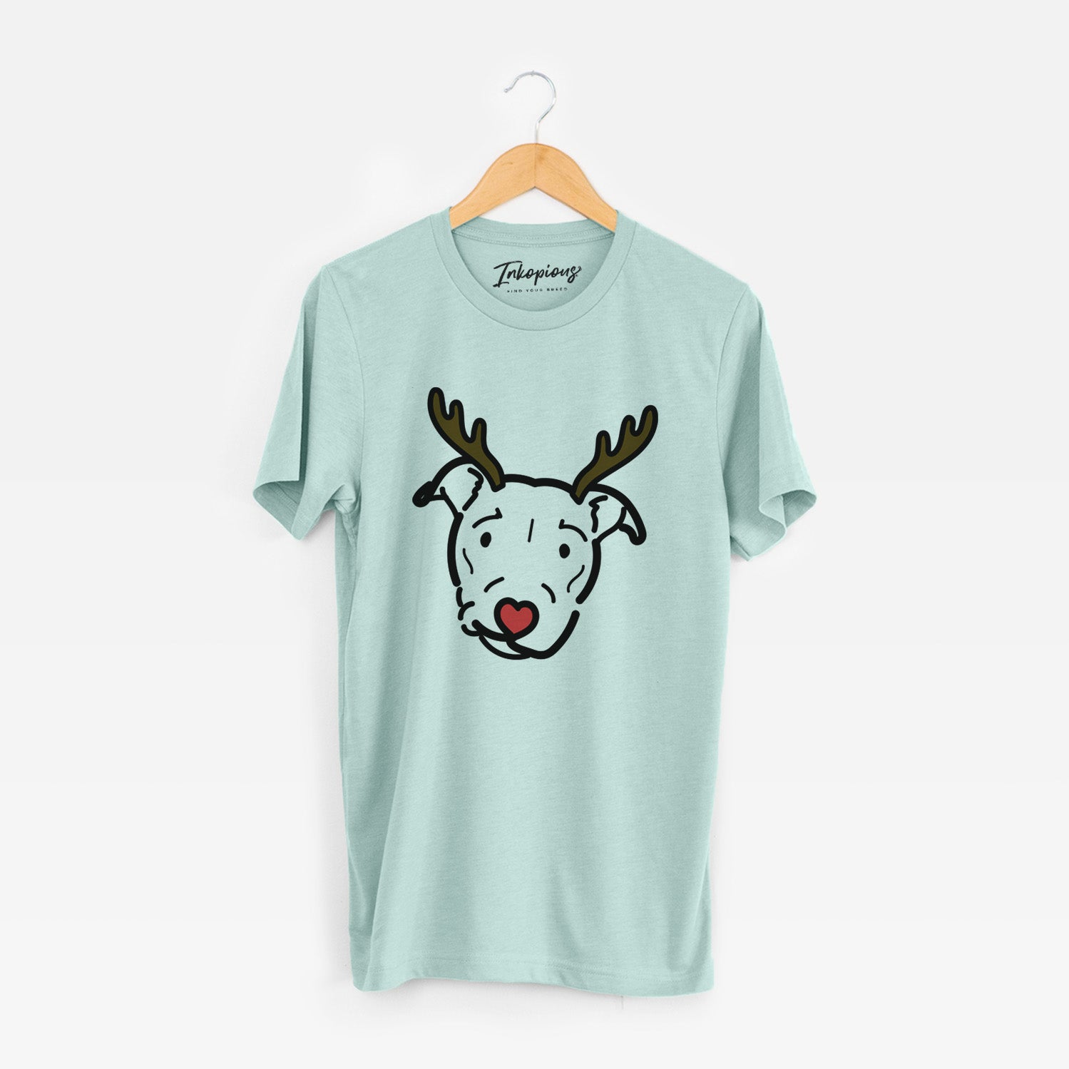 Minimalist line drawing of Ernie the Pitbull Mix with reindeer antlers and a red nose on a Heather Sage Unisex crewneck