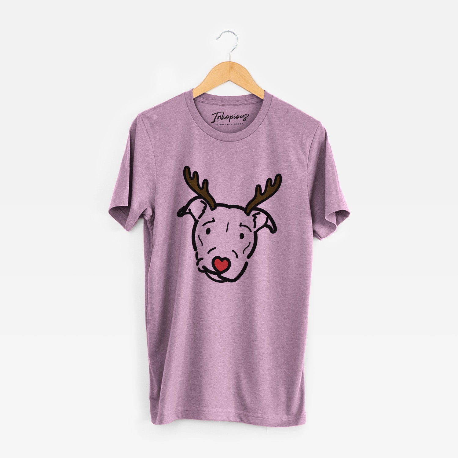 Minimalist line drawing of Ernie the Pitbull Mix with reindeer antlers and a red nose on an Orchid Unisex crewneck