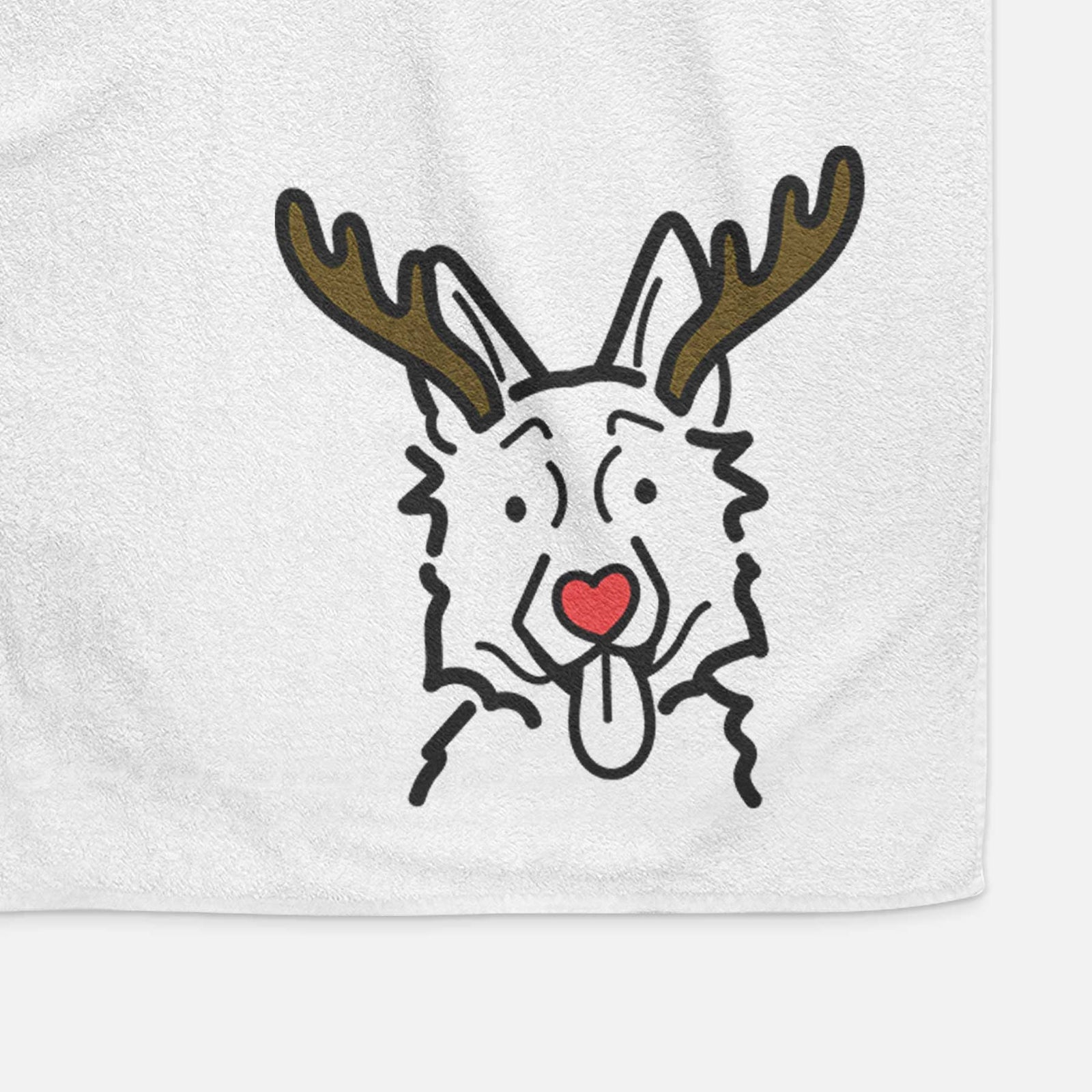 Minimalist line drawing of a German Shepherd with reindeer antlers and a red nose on a decorative hand towel
