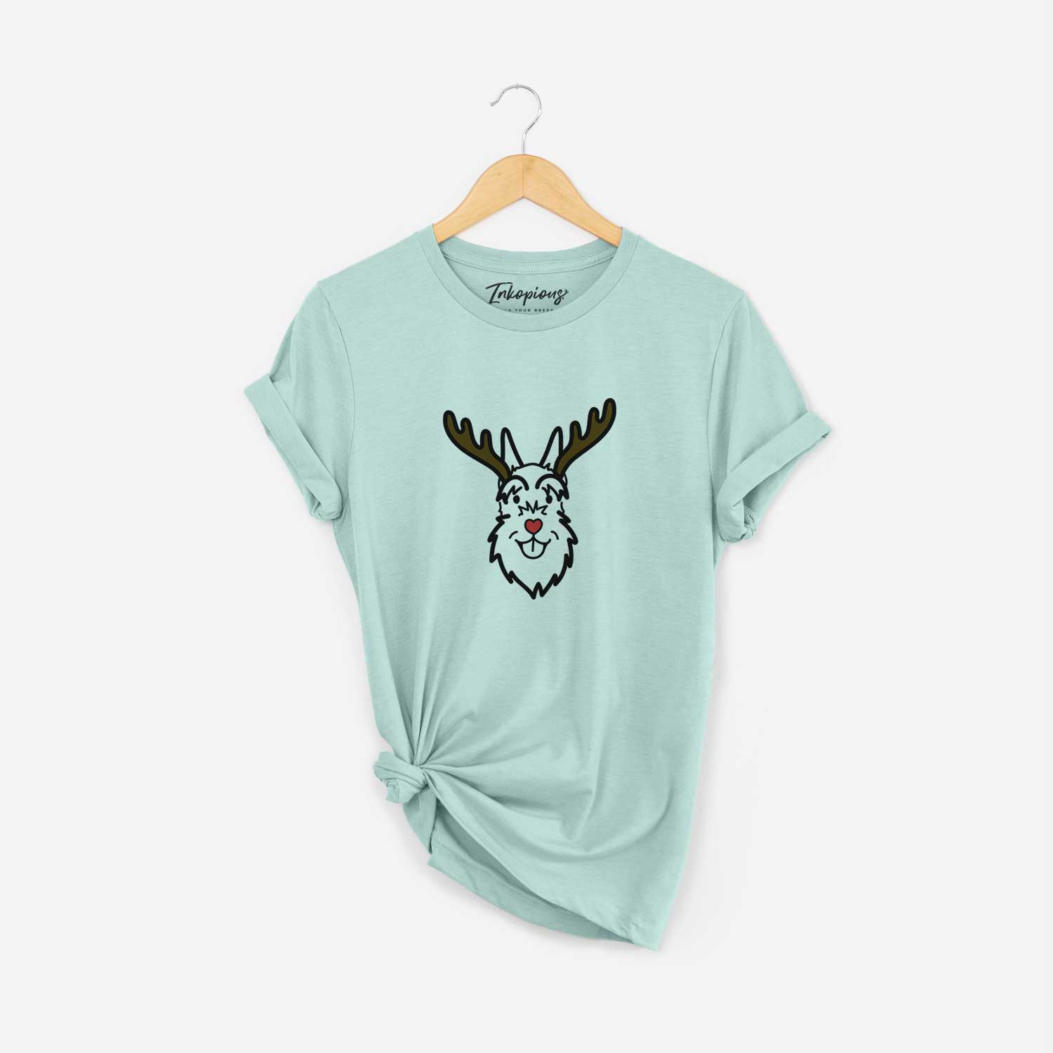 Minimalist line drawing of a Schnauzer Cropped Ears with reindeer antlers and a red nose on a Heather Sage Unisex crewneck