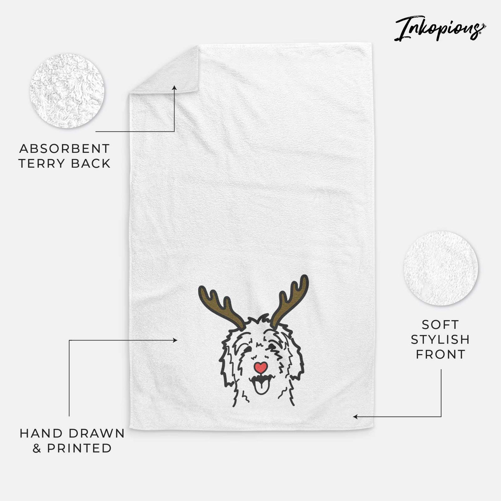 Minimalist line drawing of a Goldendoodle with reindeer antlers and a red nose on a decorative hand towel