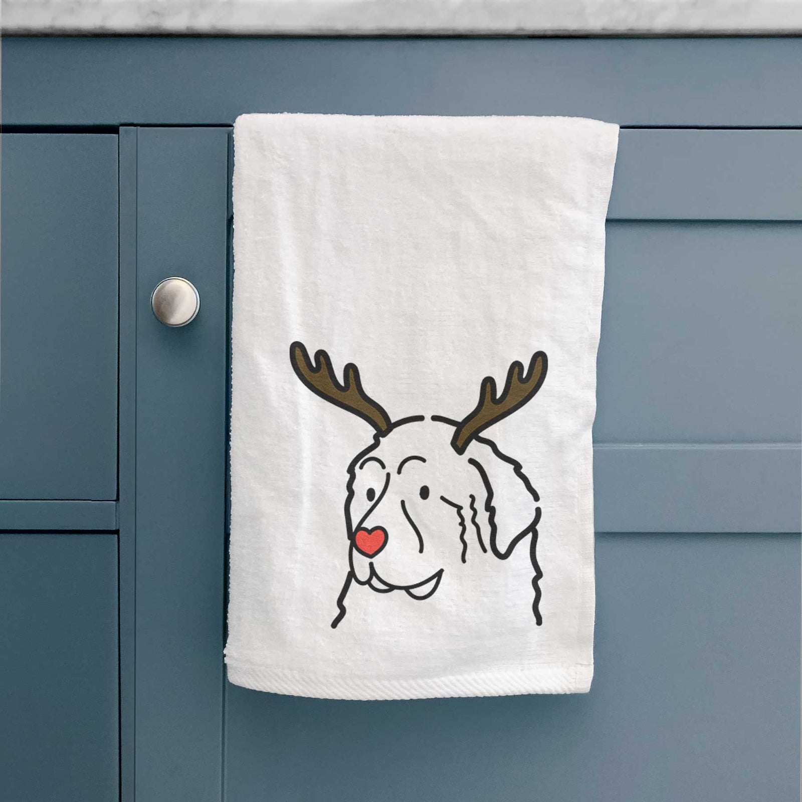 Minimalist line drawing of a Great Pyrenees with reindeer antlers and a red nose on a decorative hand towel