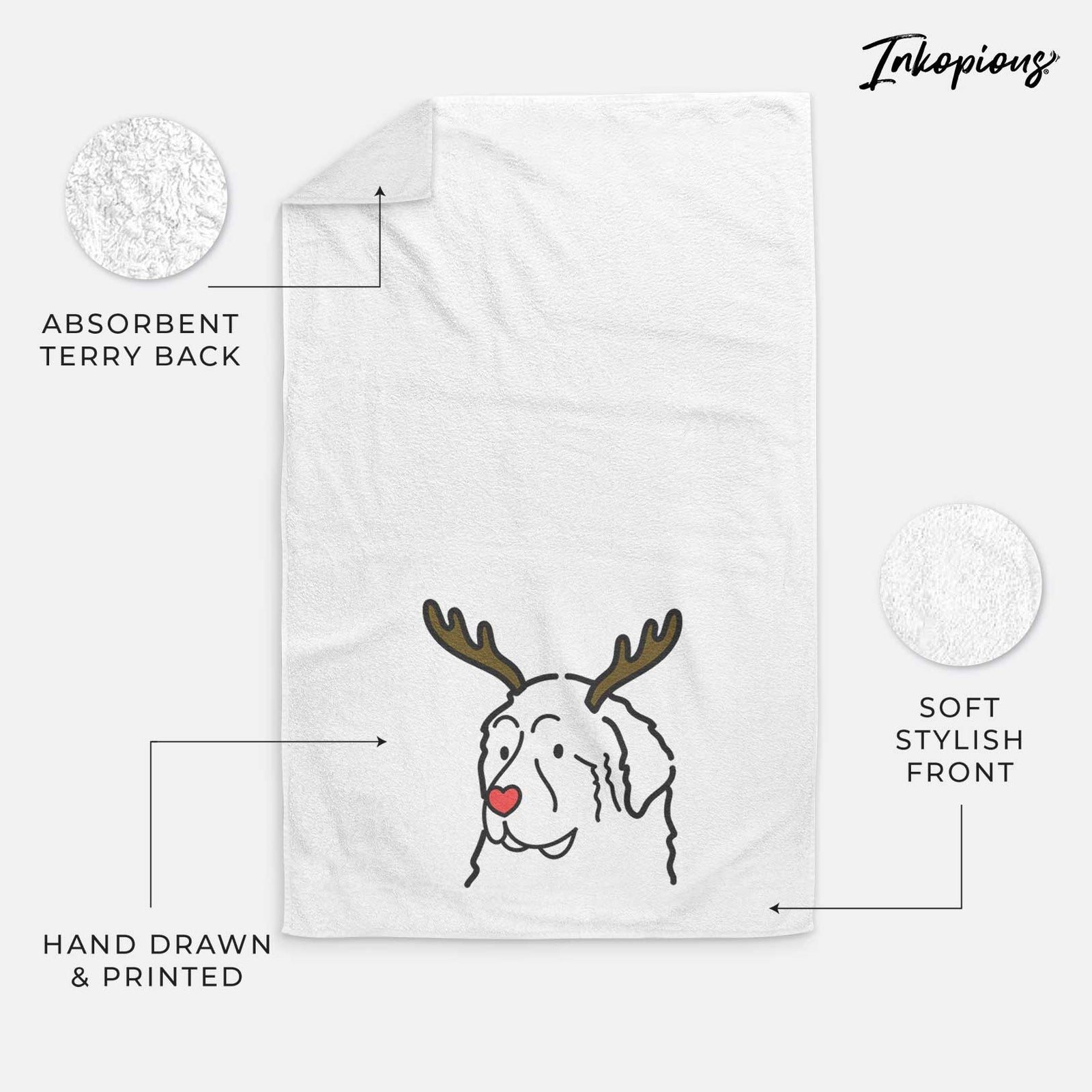 Minimalist line drawing of a Great Pyrenees with reindeer antlers and a red nose on a decorative hand towel