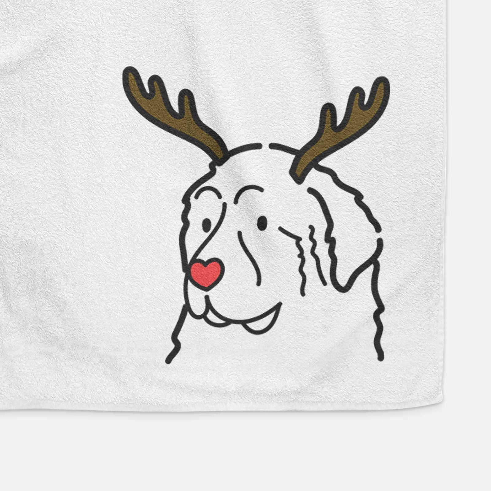 Minimalist line drawing of a Great Pyrenees with reindeer antlers and a red nose on a decorative hand towel